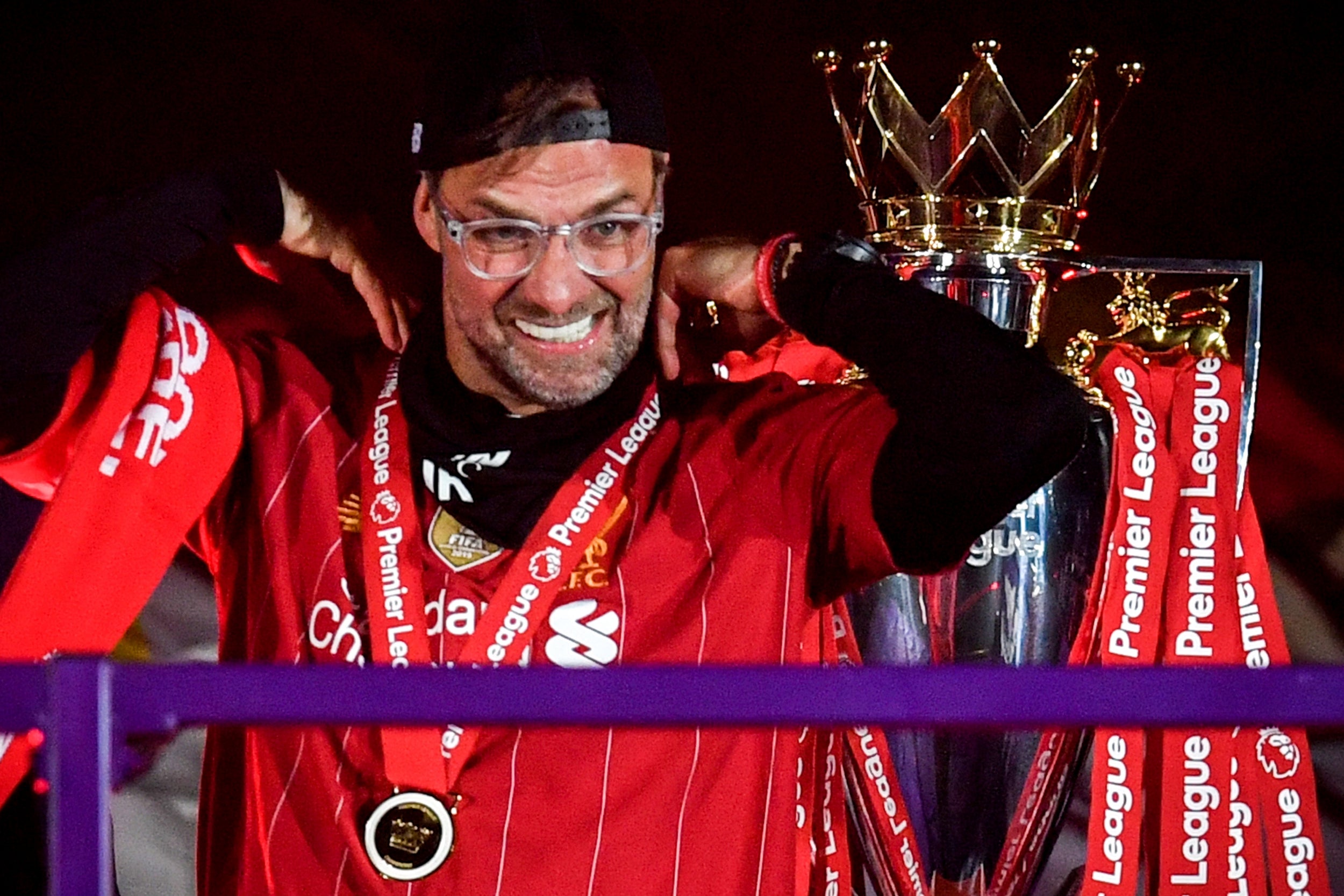 Jurgen Klopp celebrates with the trophy