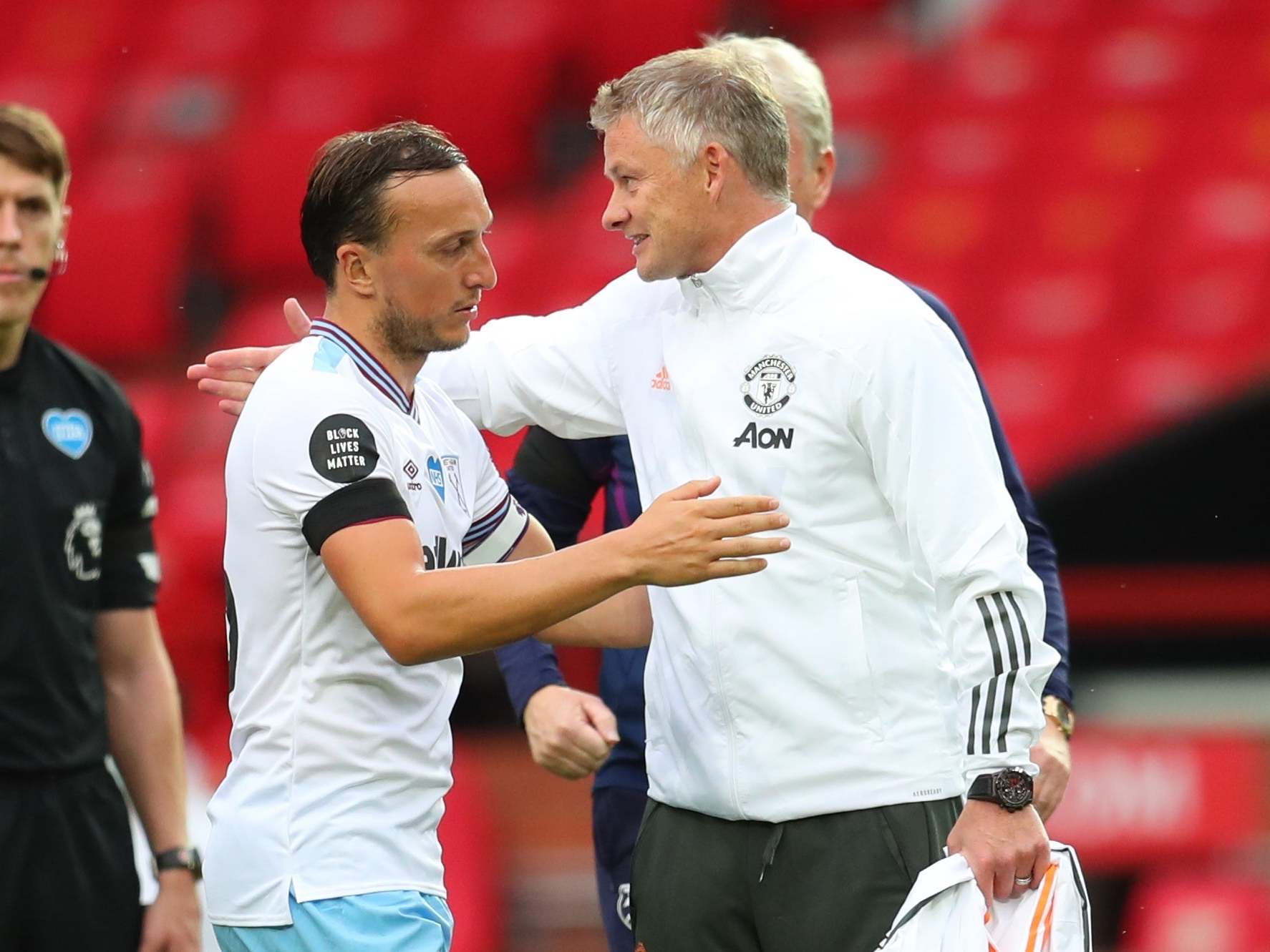 Manchester United manager Ole Gunnar Solskjaer congratulates Mark Noble (Reuters)