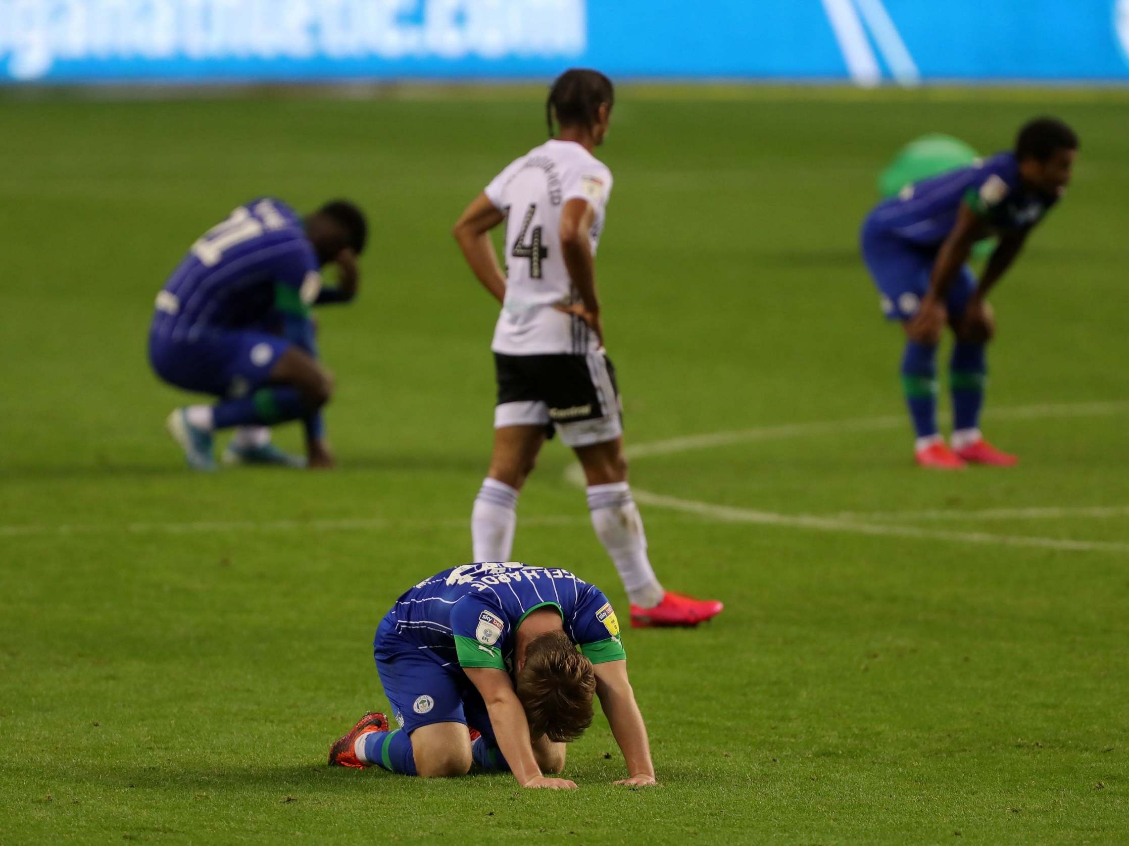 Wigan players were distraught at the final whistle