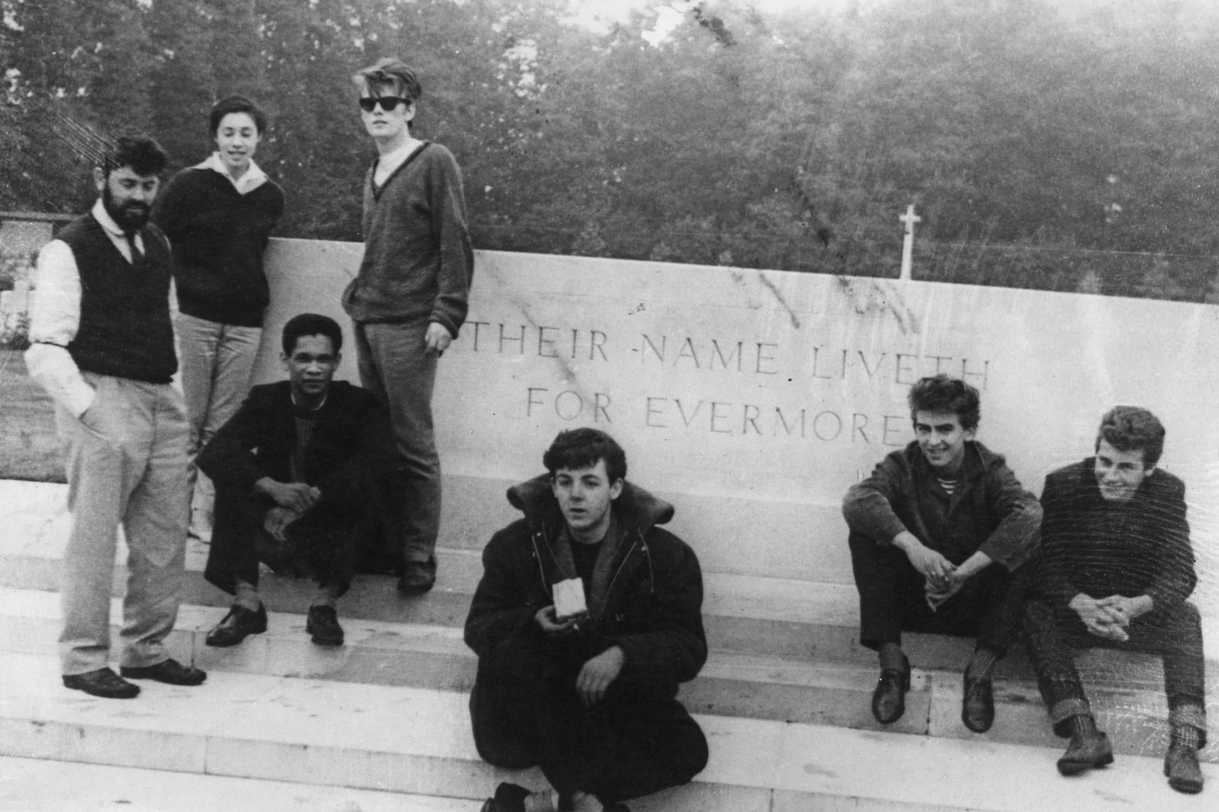 An early incarnation of the band photographed, possibly by Lennon, at the Arnhem War Memorial in the eastern Netherlands. Sutcliffe is fourth from the left