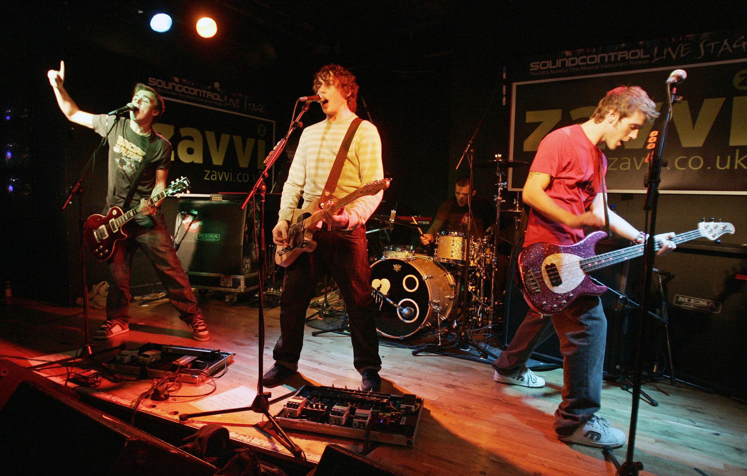 Tom Fletcher, Danny Jones and Dougie Poynter of McFly perform in 2007