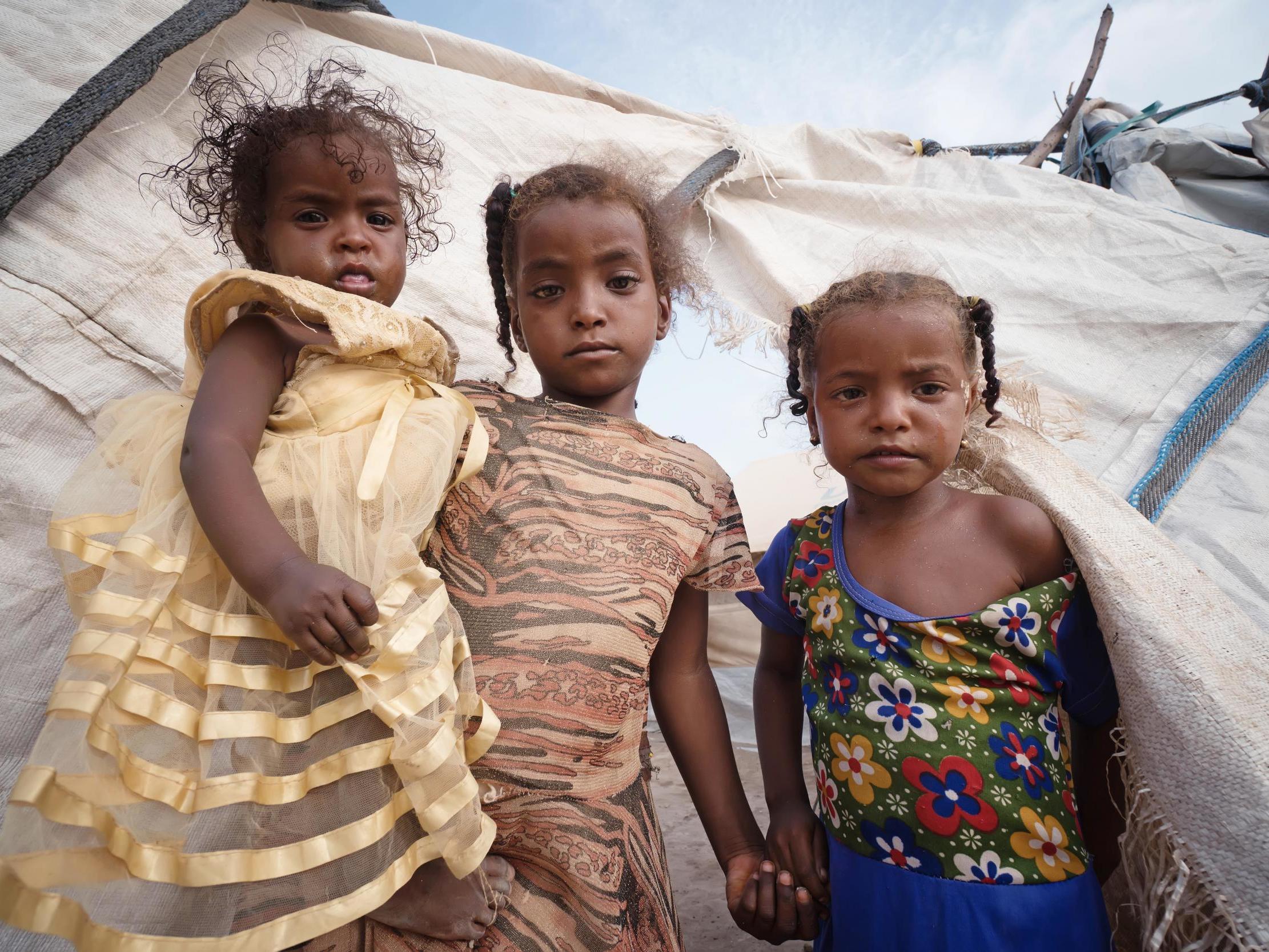 Daughters of Taghreed in the camp where they live