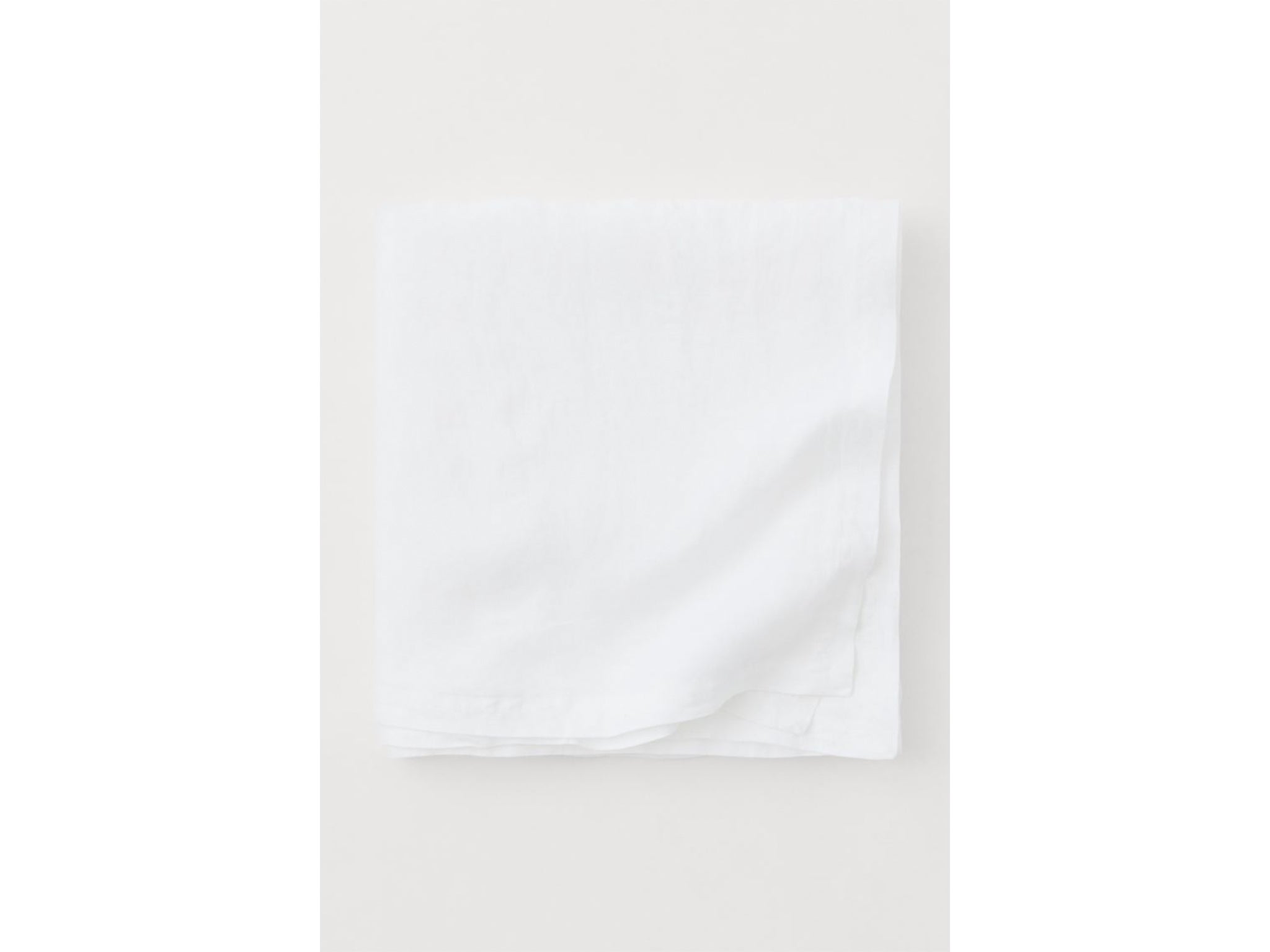 This linen tablecloth is easy to add colour to (H&amp;M)