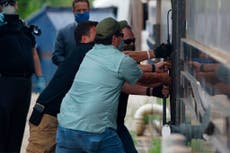 US officers force open rear door of Chinese consulate in Houston following closure order