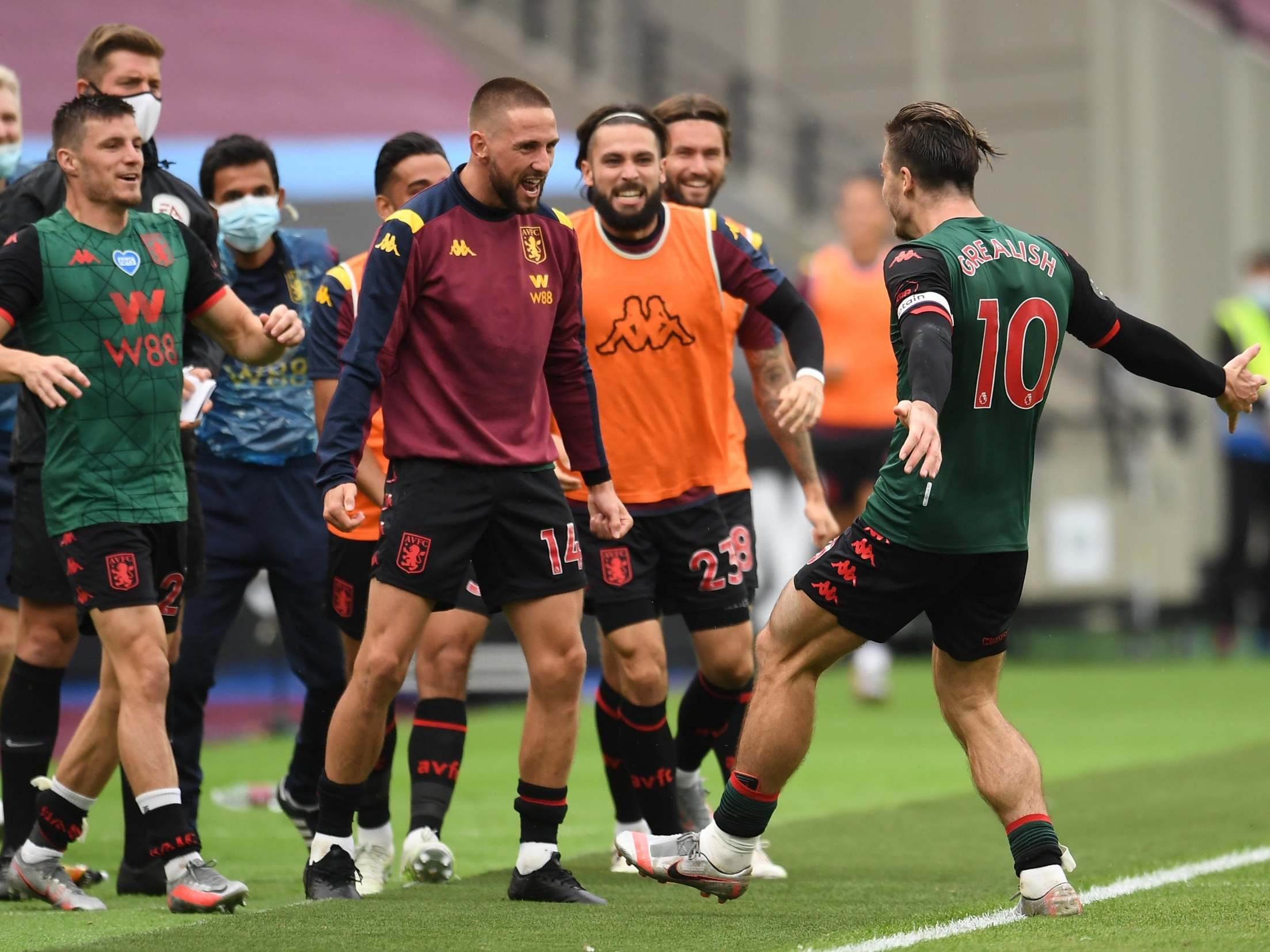 Jack Grealish celebrates after scoring Aston Villa's late goal