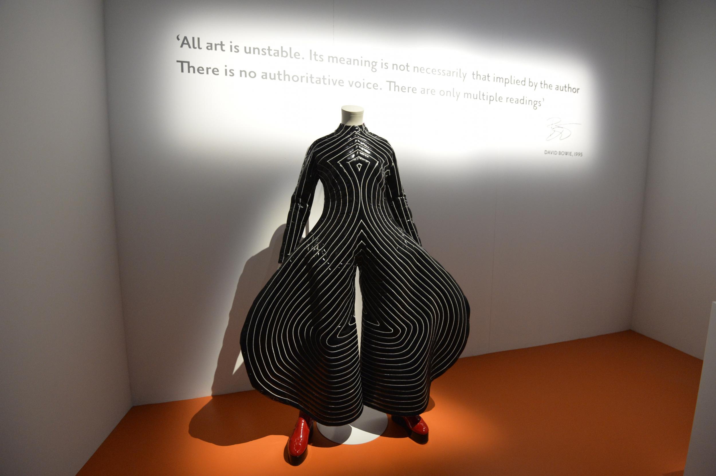 This picture taken on February 27, 2015 shows a costume created by Japanese fashion designer Kansai Yamamoto and used by David Bowie, during a press preview of an exhibition dedicated to the British singer at the Philarmonie in Paris