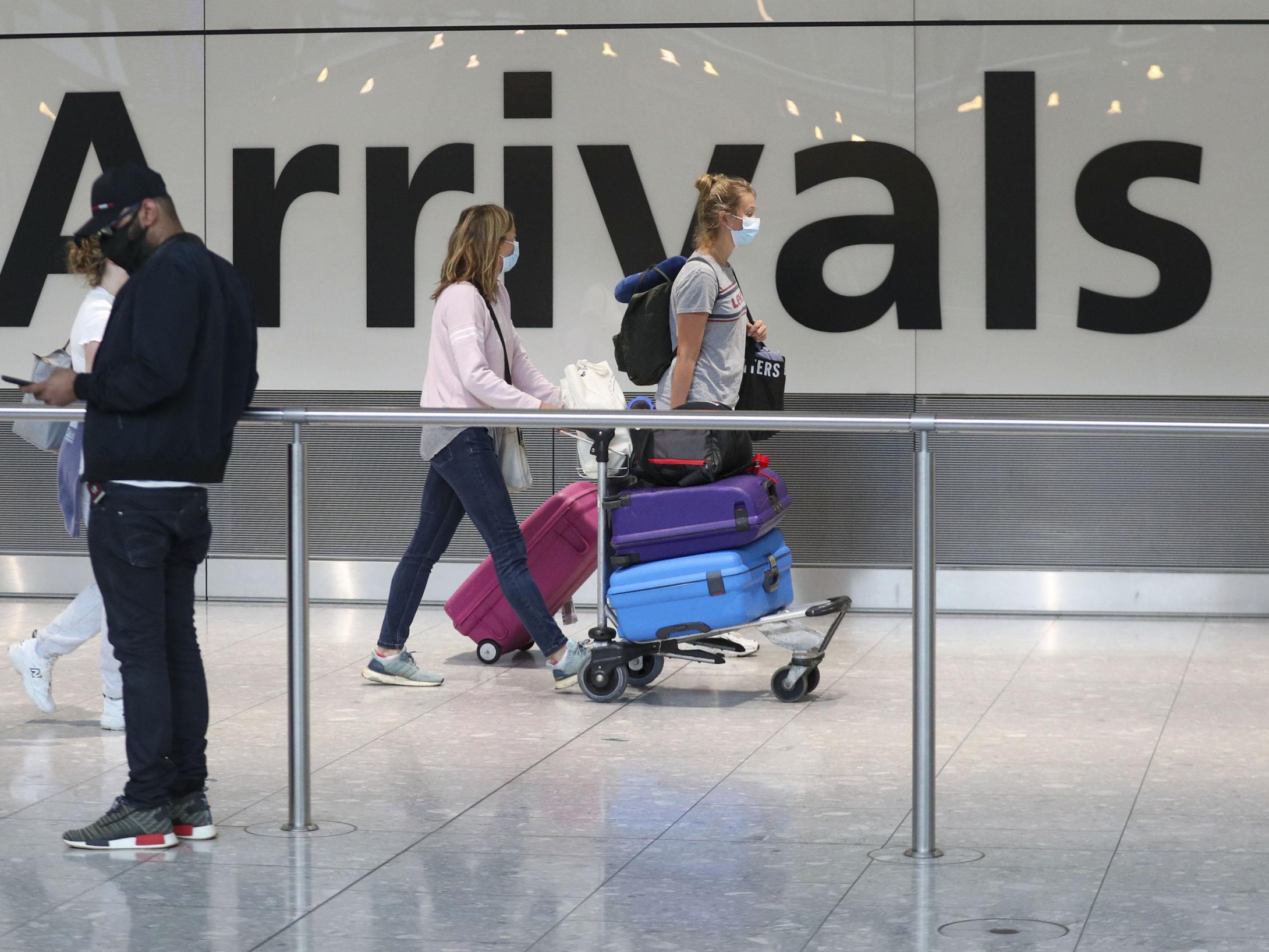 Passengers at Heathrow Airport's Terminal 5, after people returning from Spain were told they must quarantine when they return home