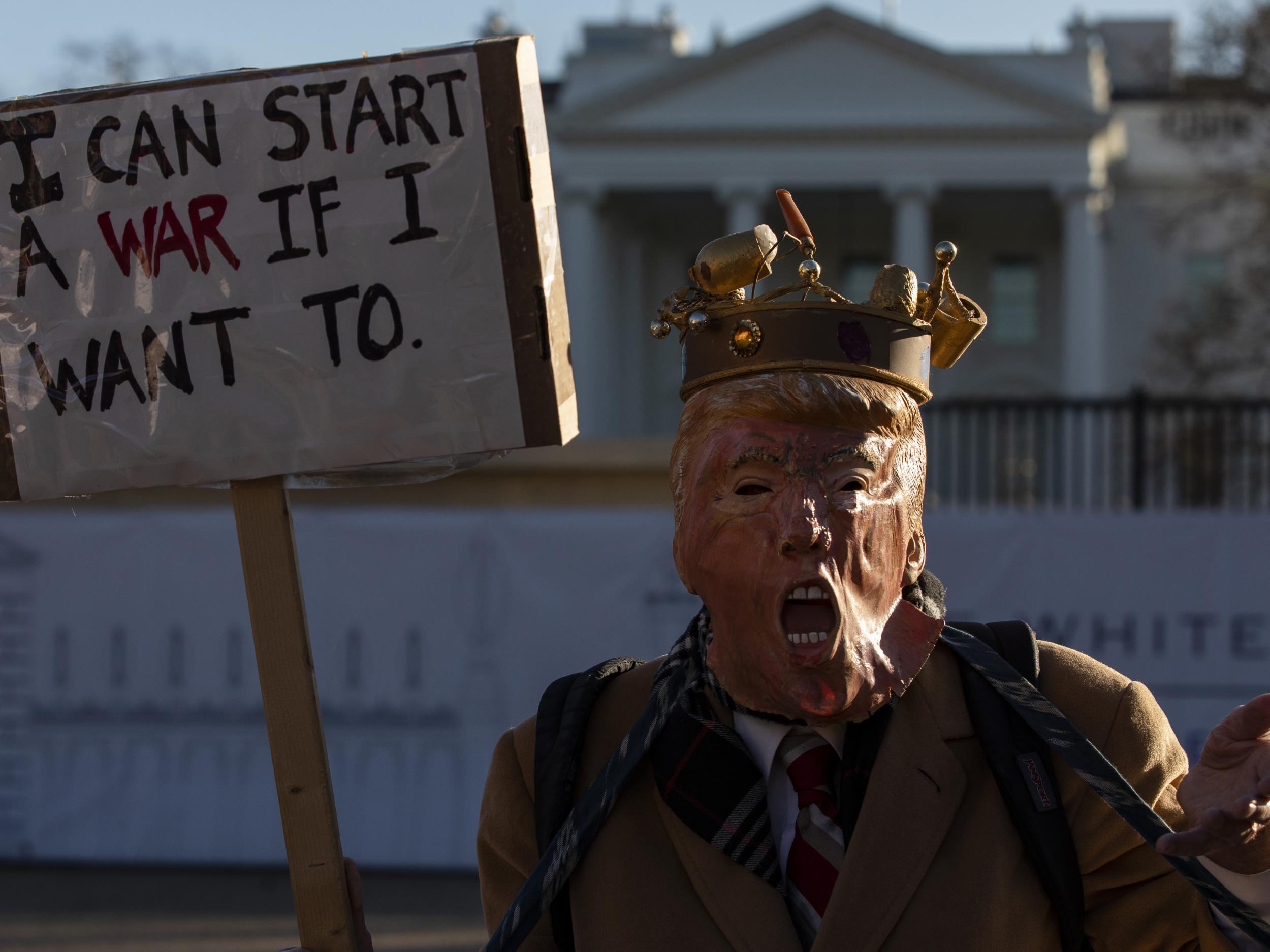 An activist dressed as President Trump protesting against rising animosity towards Iran outside the White House in January