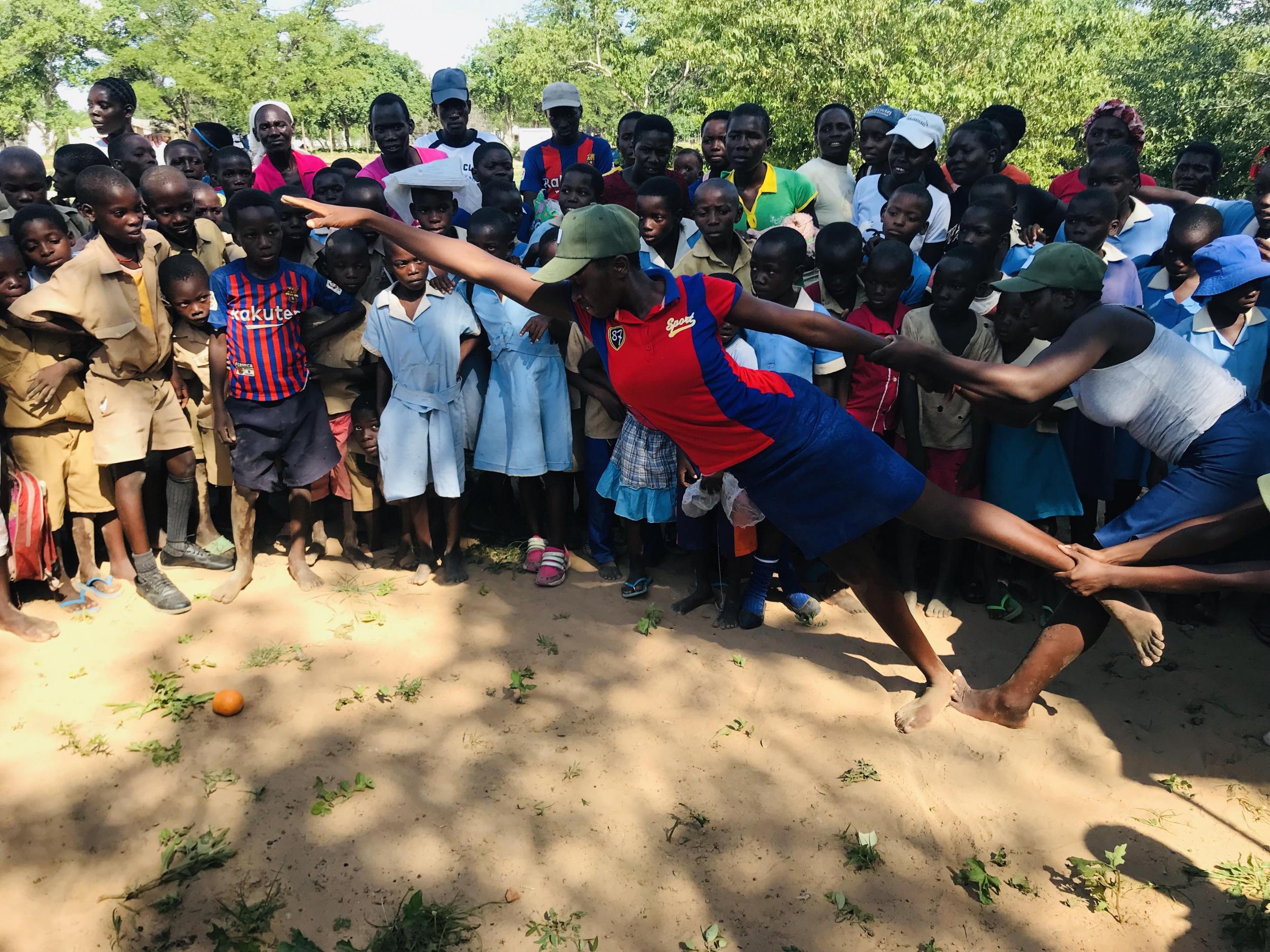 Scouts practise ‘reaching out’, a game which requires teamwork and a bit of athleticism