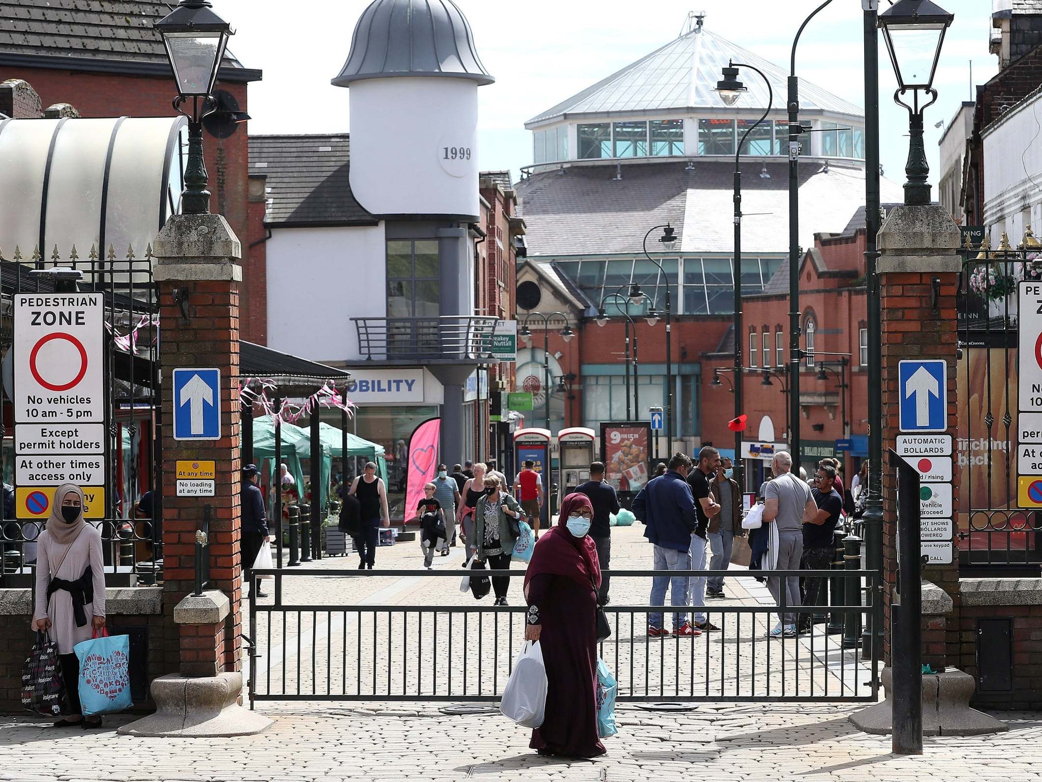 People out shopping in Oldham, Greater Manchester, 30 July 2020. (Martin Rickett/PA)