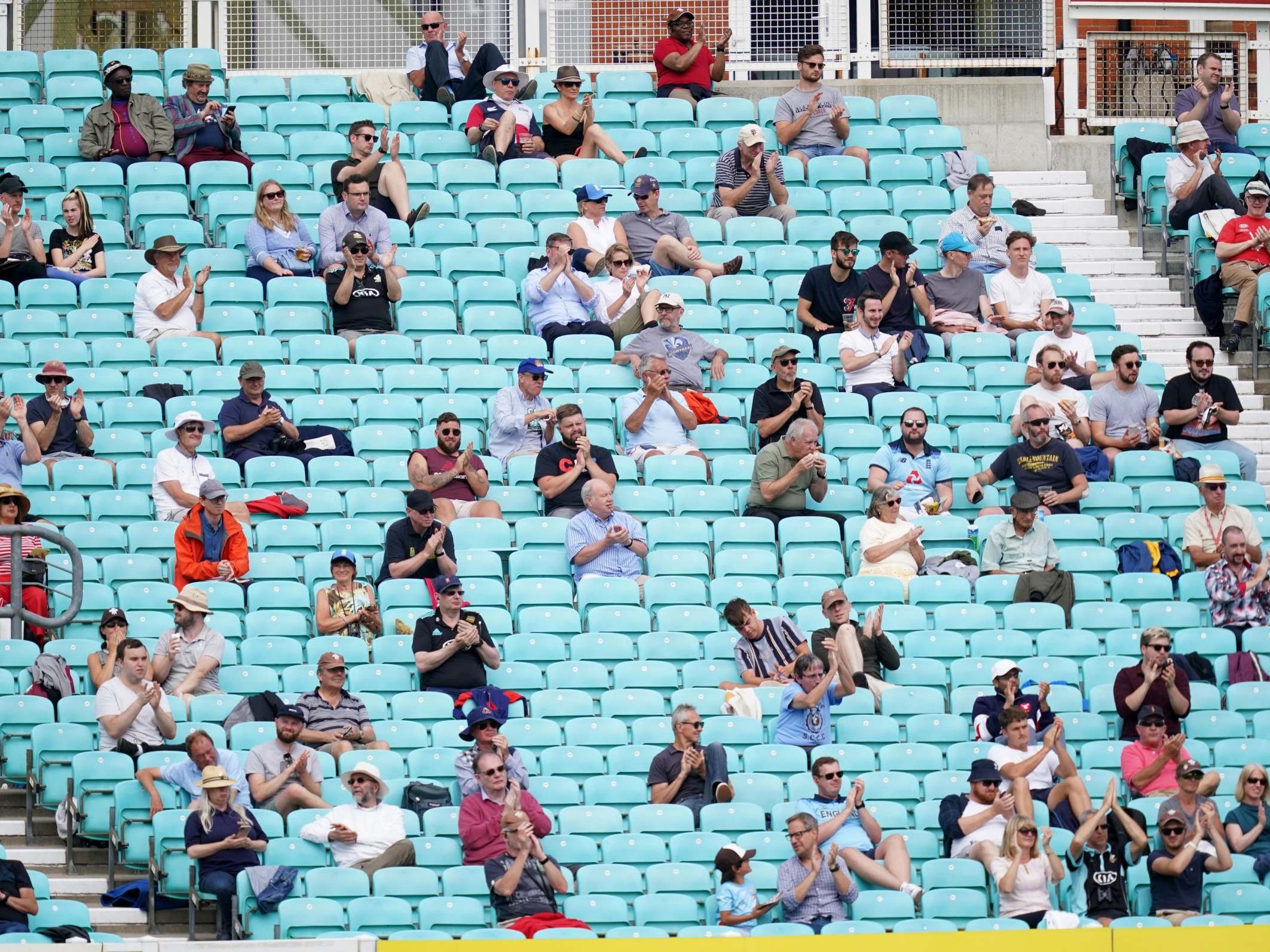 Cricket fans observe social distancing at The Kia Oval on Friday