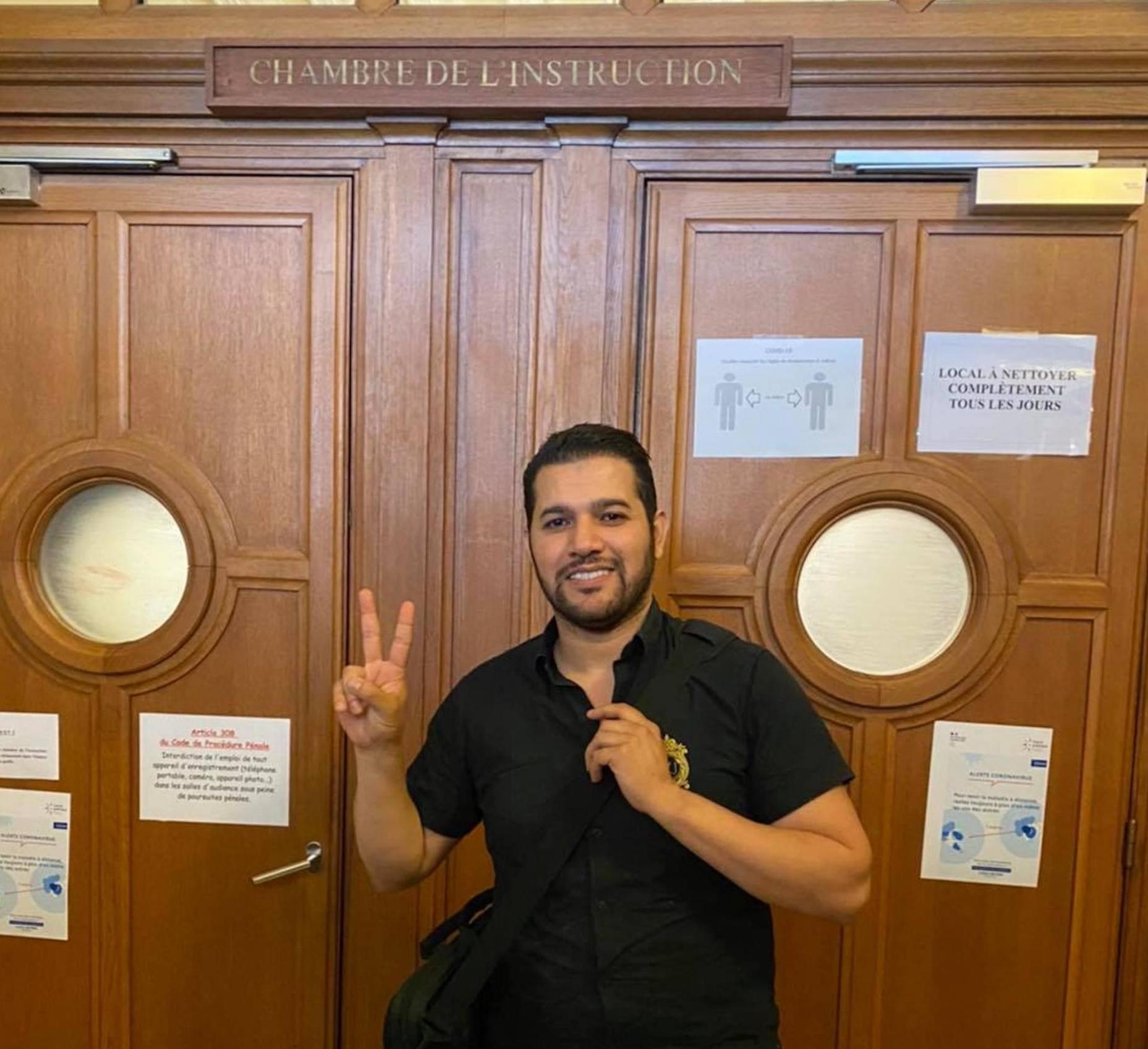 Amir Boukhors, an Algerian activist, appears outside a courtroom in France in July after spending 24 hours in jail because of an extradition demand by the government in Algiers