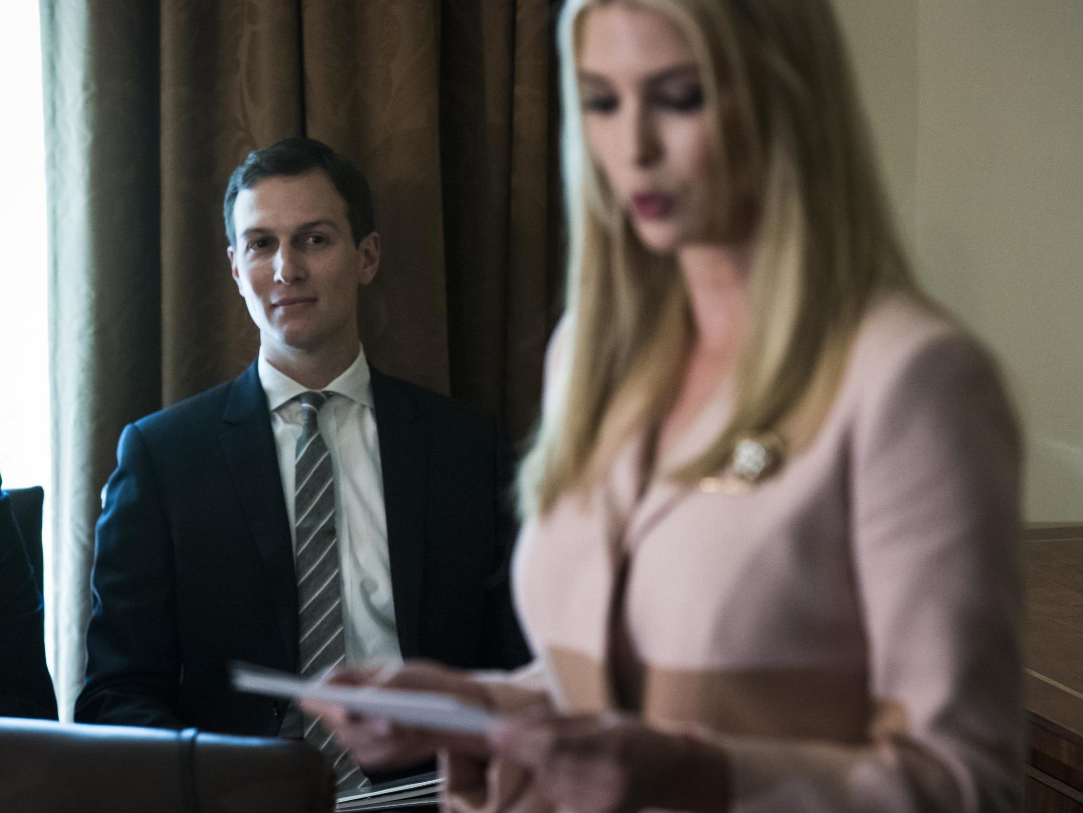 Jared Kushner listens as Ivanka Trump speaks during a cabinet meeting at the White House on 18 July