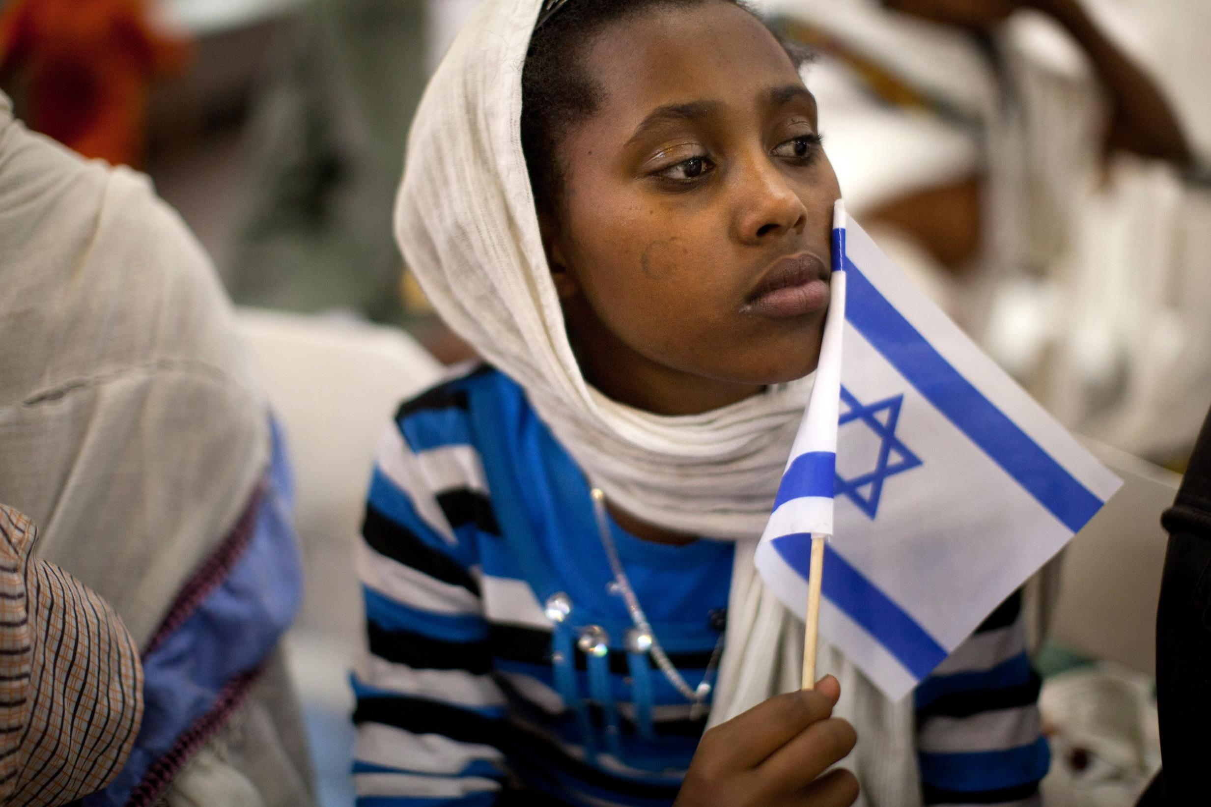 A Jewish immigrant during a welcoming ceremony after arriving in Tel Aviv from Ethiopia in 2012