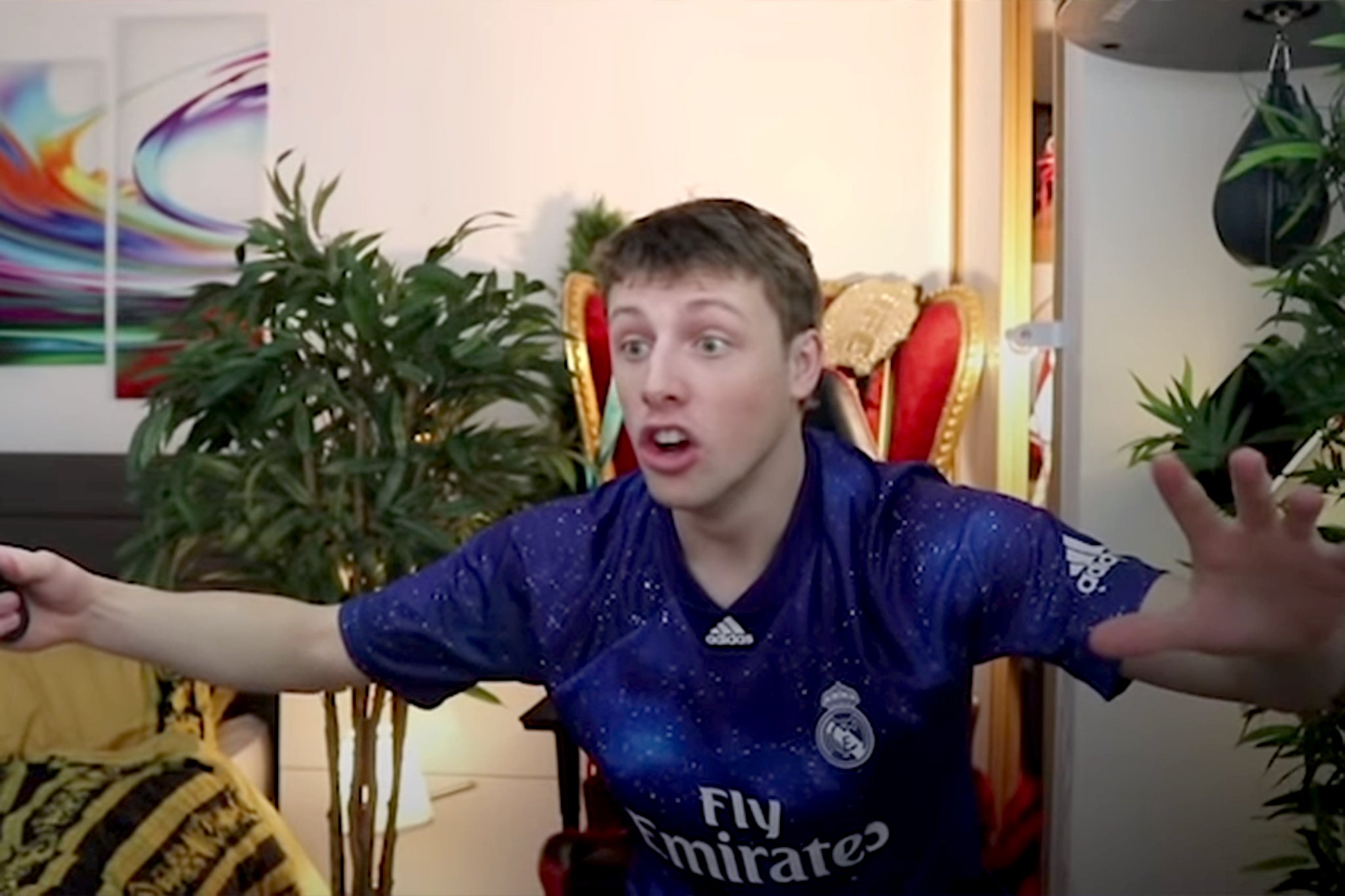 One excited young gamer opening a favourable Fifa pack