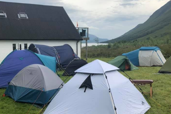 There were 10 tents pitched outside the house