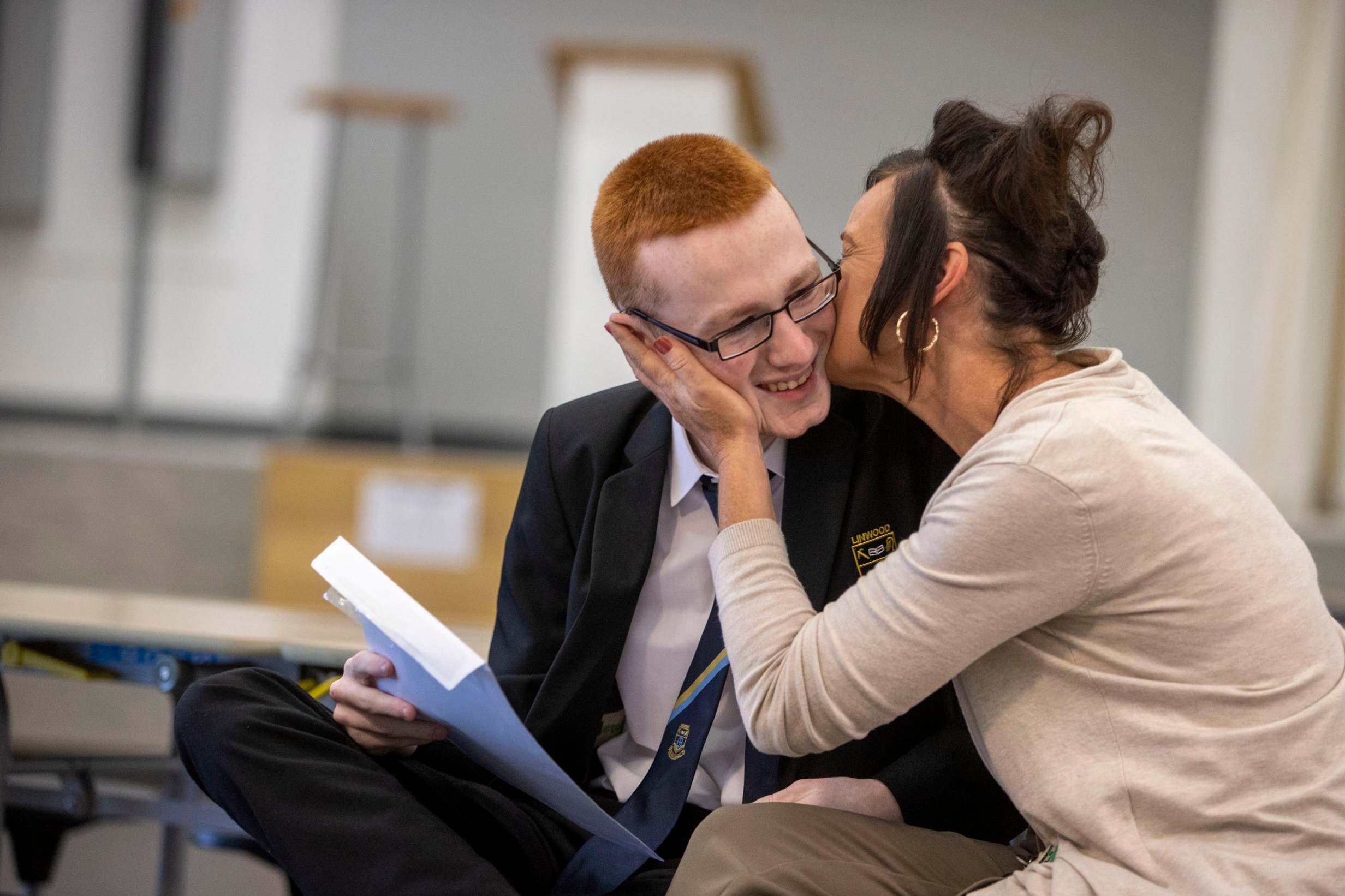 Dylan Kidd finding out his exam results with his mum Susan Boyes at Linwood High in Renfrewshire