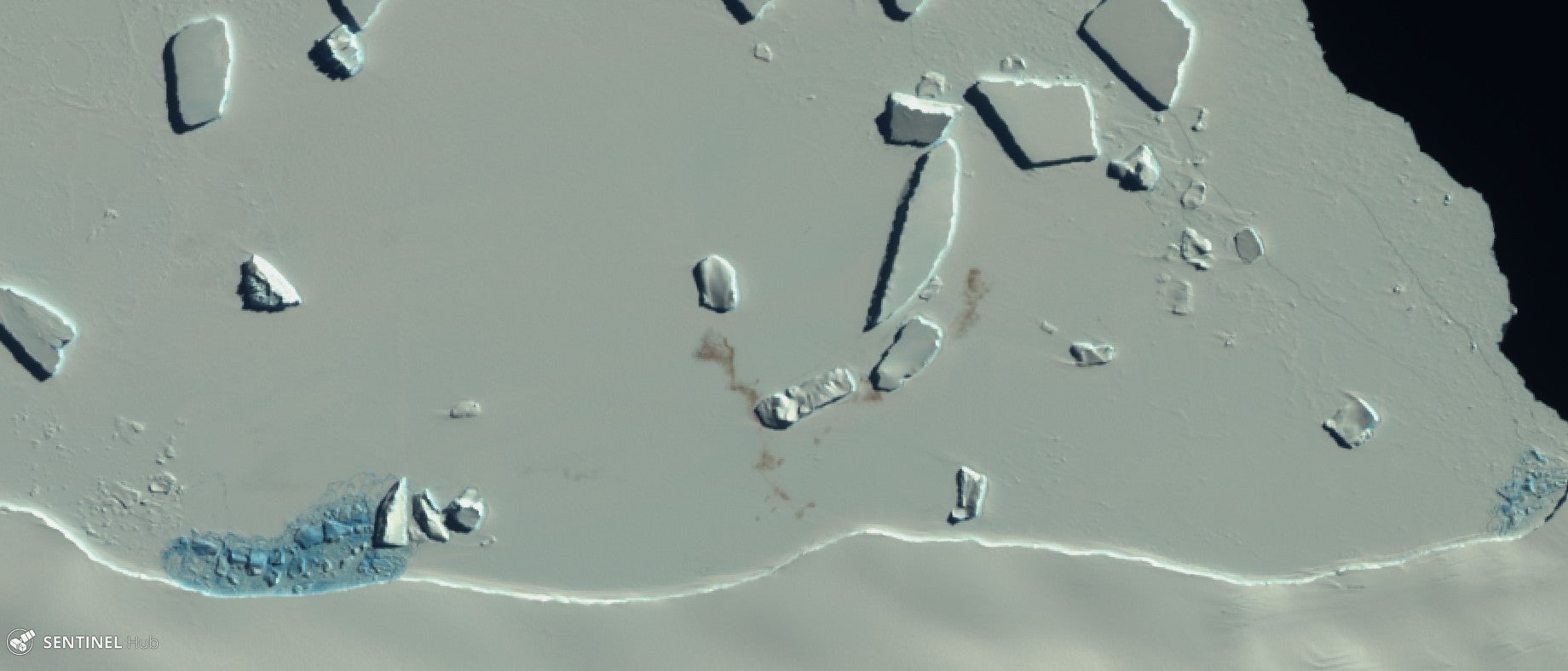 A satellite image showing stained patches of ice – evidence of a penguin colony