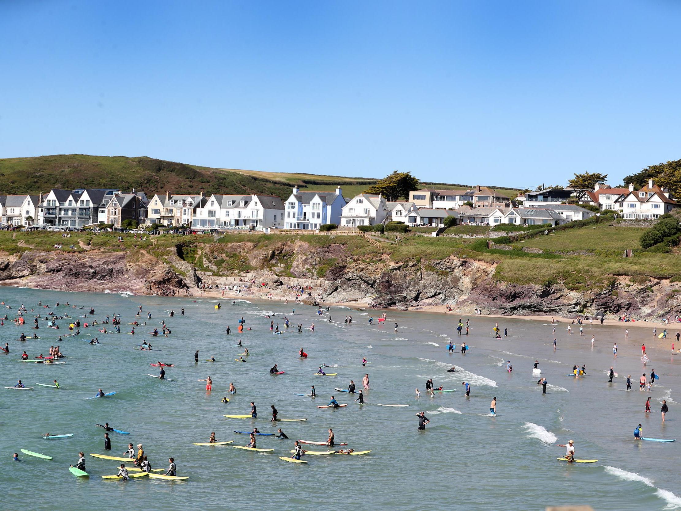 Holidaymakers enjoy Polzeath beach in July