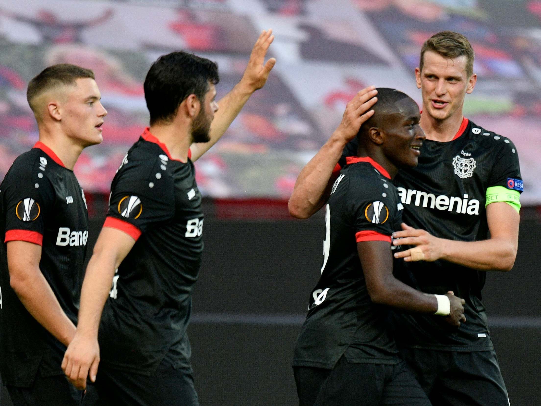 Leverkusen celebrate after Moussa Diaby’s second-half goal