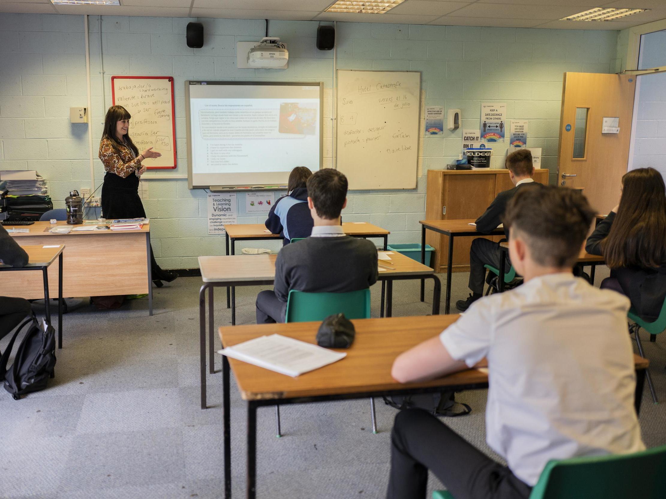 Pupils sit apart during a socially distanced lesson