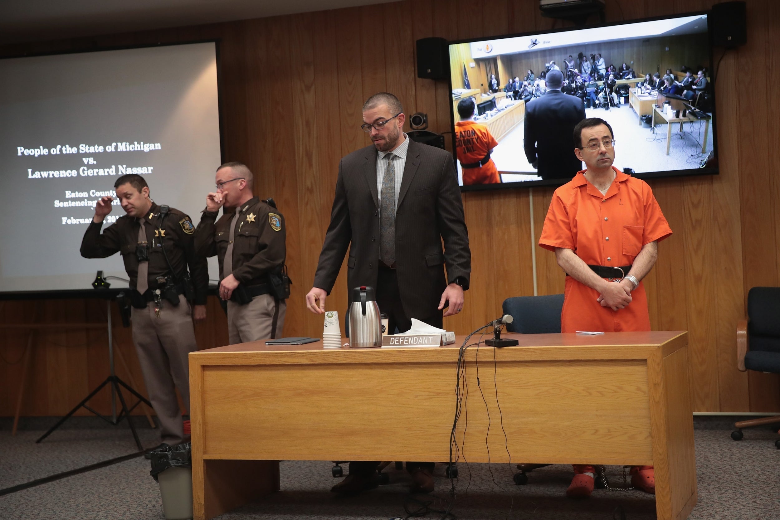 Larry Nassar (right), former doctor for USA Gymnastics and Michigan State University, received a life sentence for multiple sexual assaults on minors