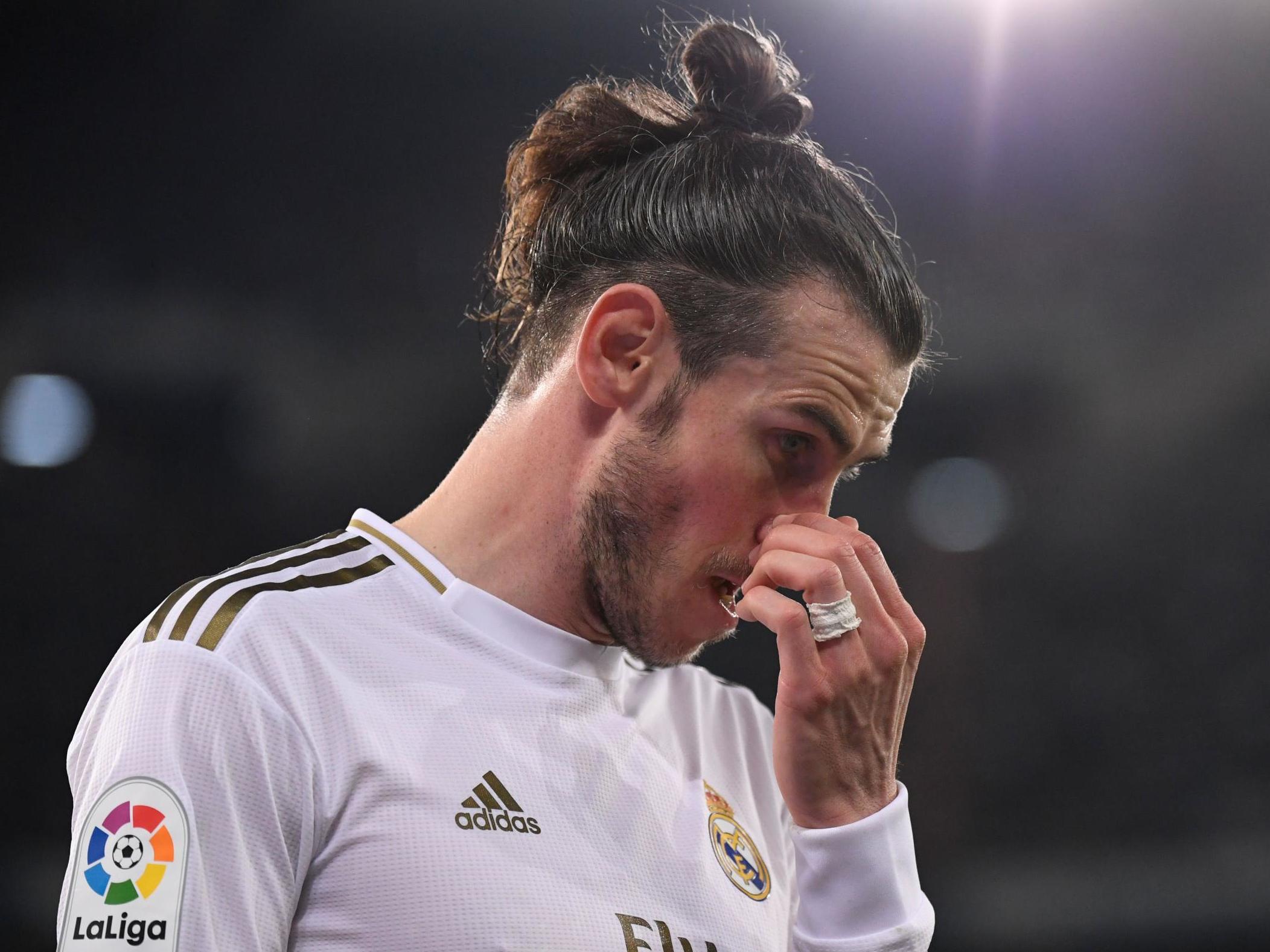 Bale has grown disillusioned with life at Real Madrid (AFP via Getty)