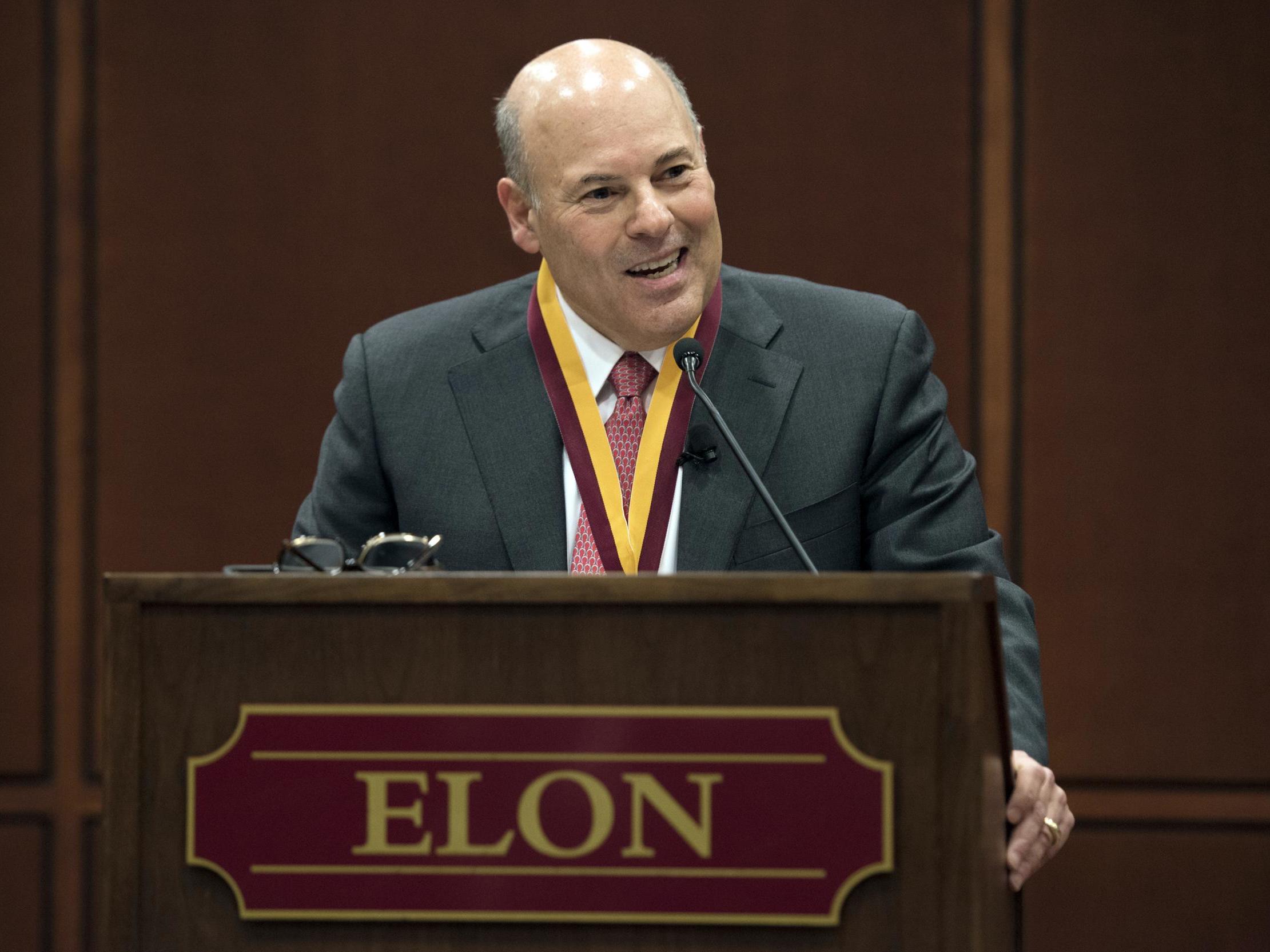 In this March 1, 2017, file photo, then Elon Trustee Louis DeJoy is honored with Elon's Medal for Entrepreneurial Leadership in Elon. N.C. U.S. Sen. Joe Manchin and union officials say the U.S. Postal Service is considering closing post offices across the country, sparking worries ahead the anticipated surge of mail-in ballots in the 2020 elections.