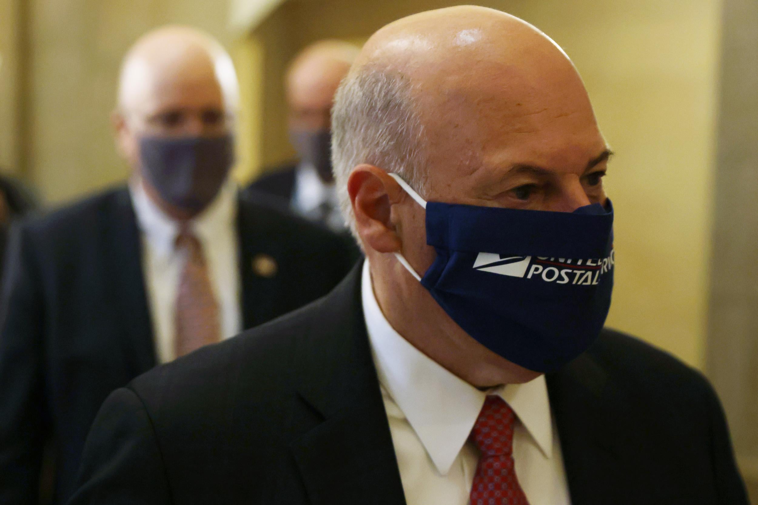 US Postmaster General Louis Dejoy arrives at a meeting at the office of Speaker of the House Representative Nancy Pelosi at the US Capitol