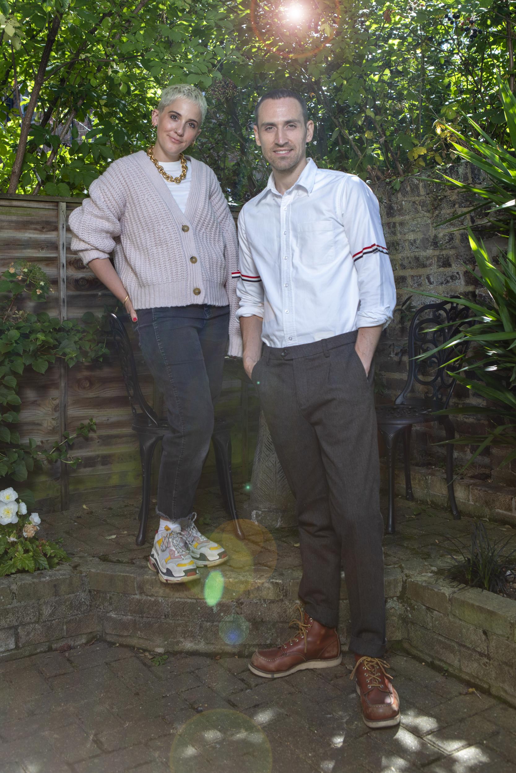 Harriet is wearing a Samsøe Samsøe cardigan and Ryan in wearing Scotch & Soda trousers