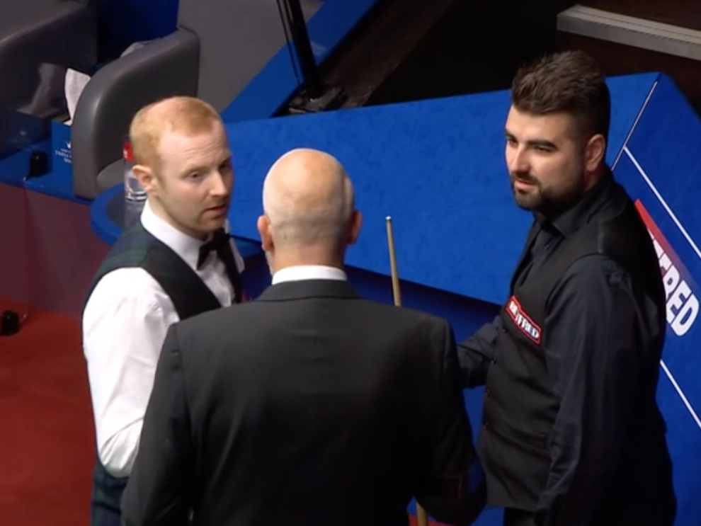 Anthony McGill and Jamie Clarke exchange words