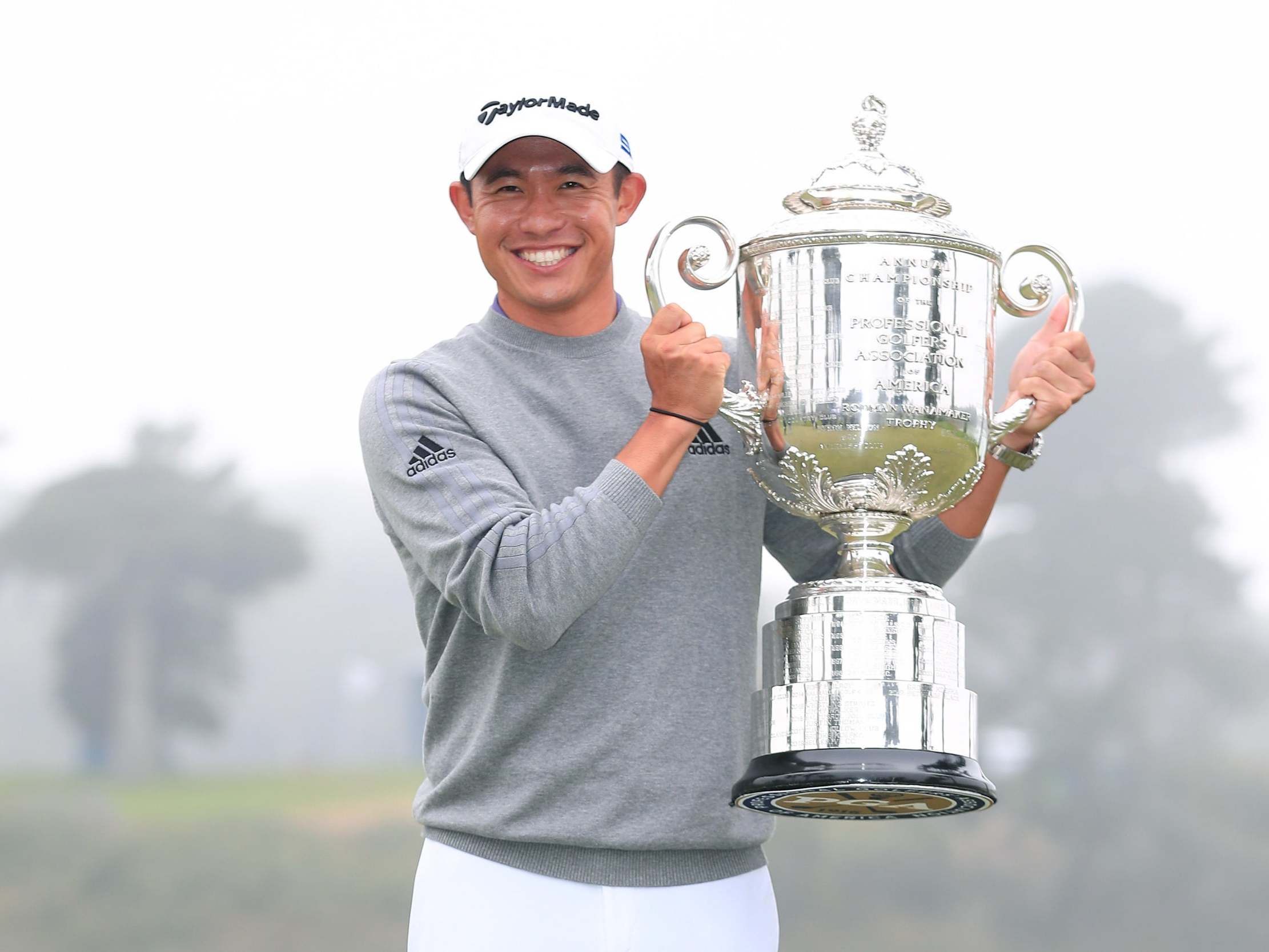 Collin Morikawa celebrates winning the PGA Championship to clinch his first major title