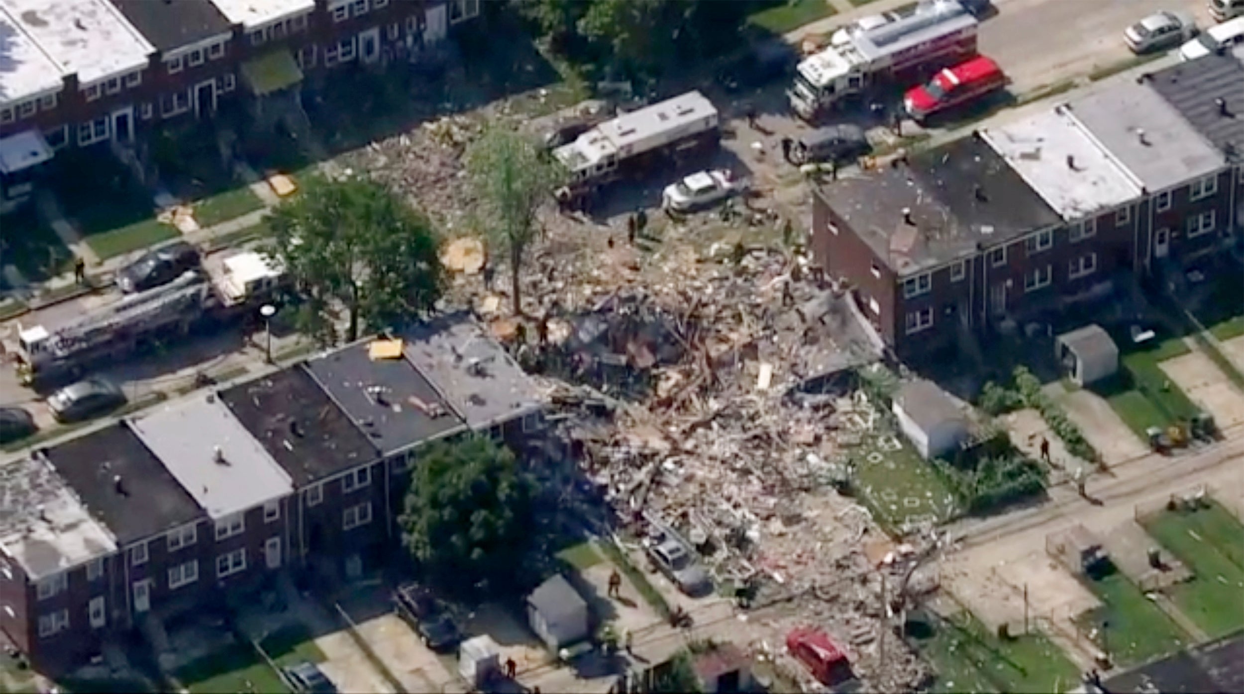 Houses explode and people trapped after 'major' blast in Baltimore