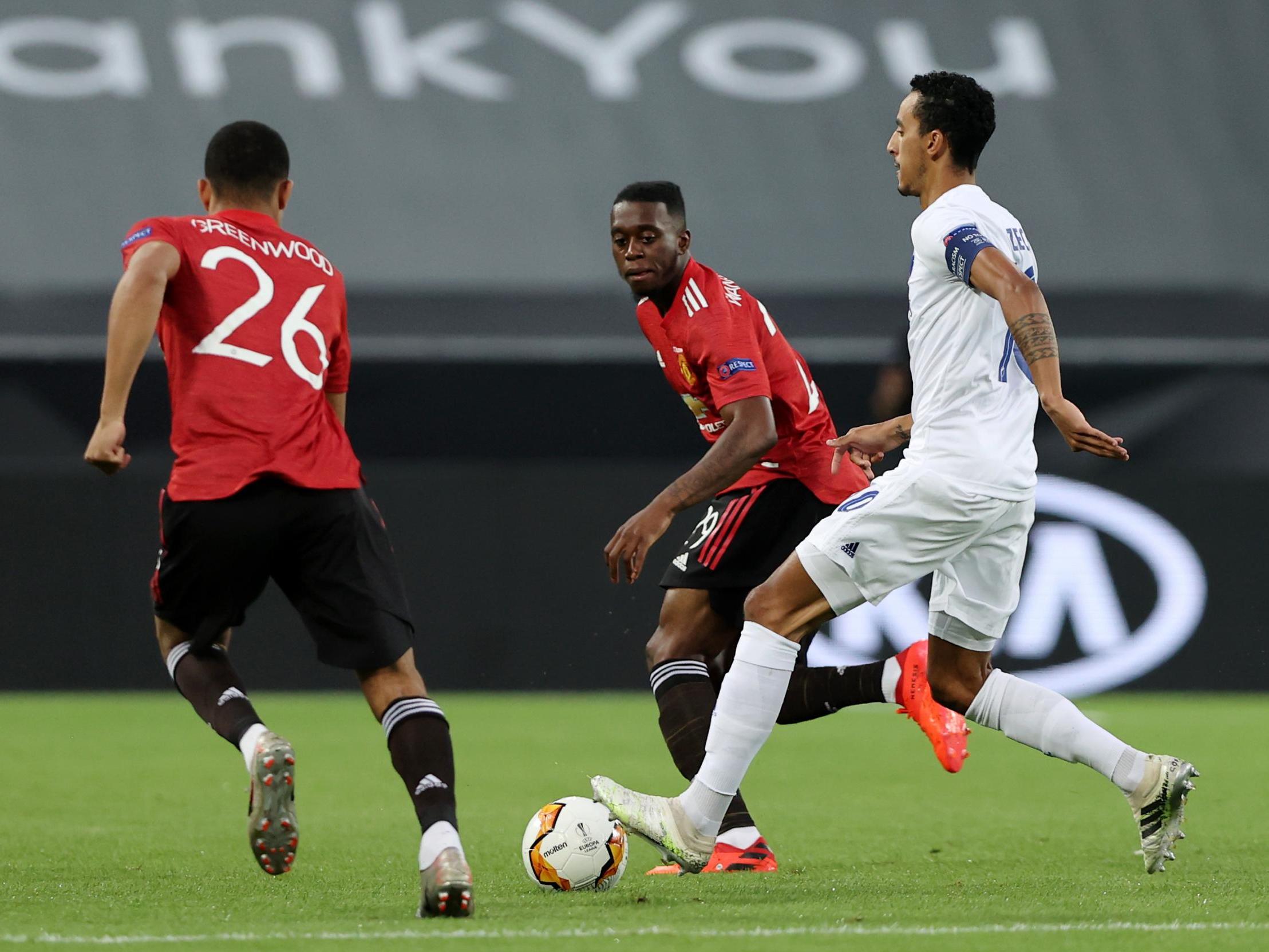 Zeca is put under pressure by Mason Greenwood and Aaron Wan-Bissaka