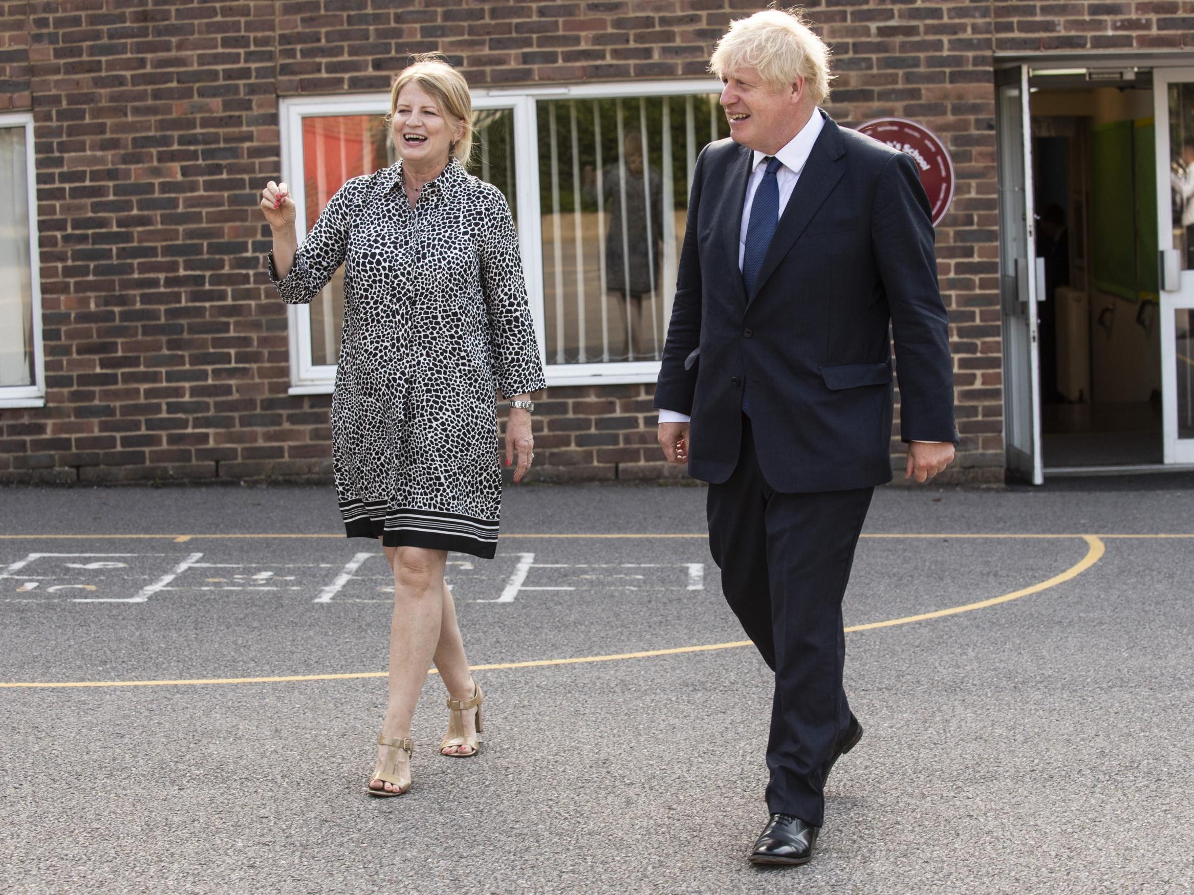 Headteacher Bernadette Matthews shows Boris Johnson the measures being implemented at St Joseph’s Catholic Primary School in London to ensure children can return safely in September