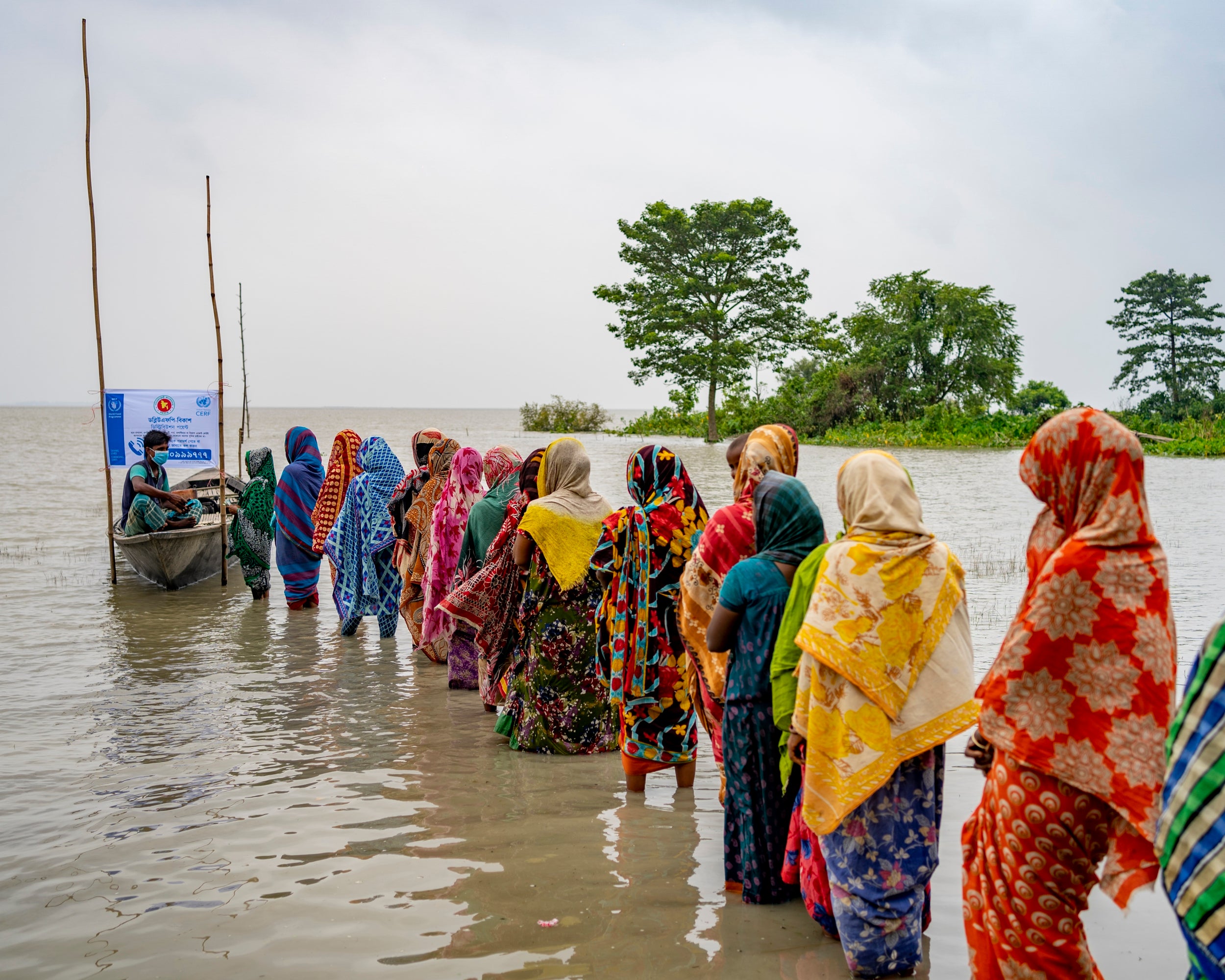 Women line up to withdraw cash