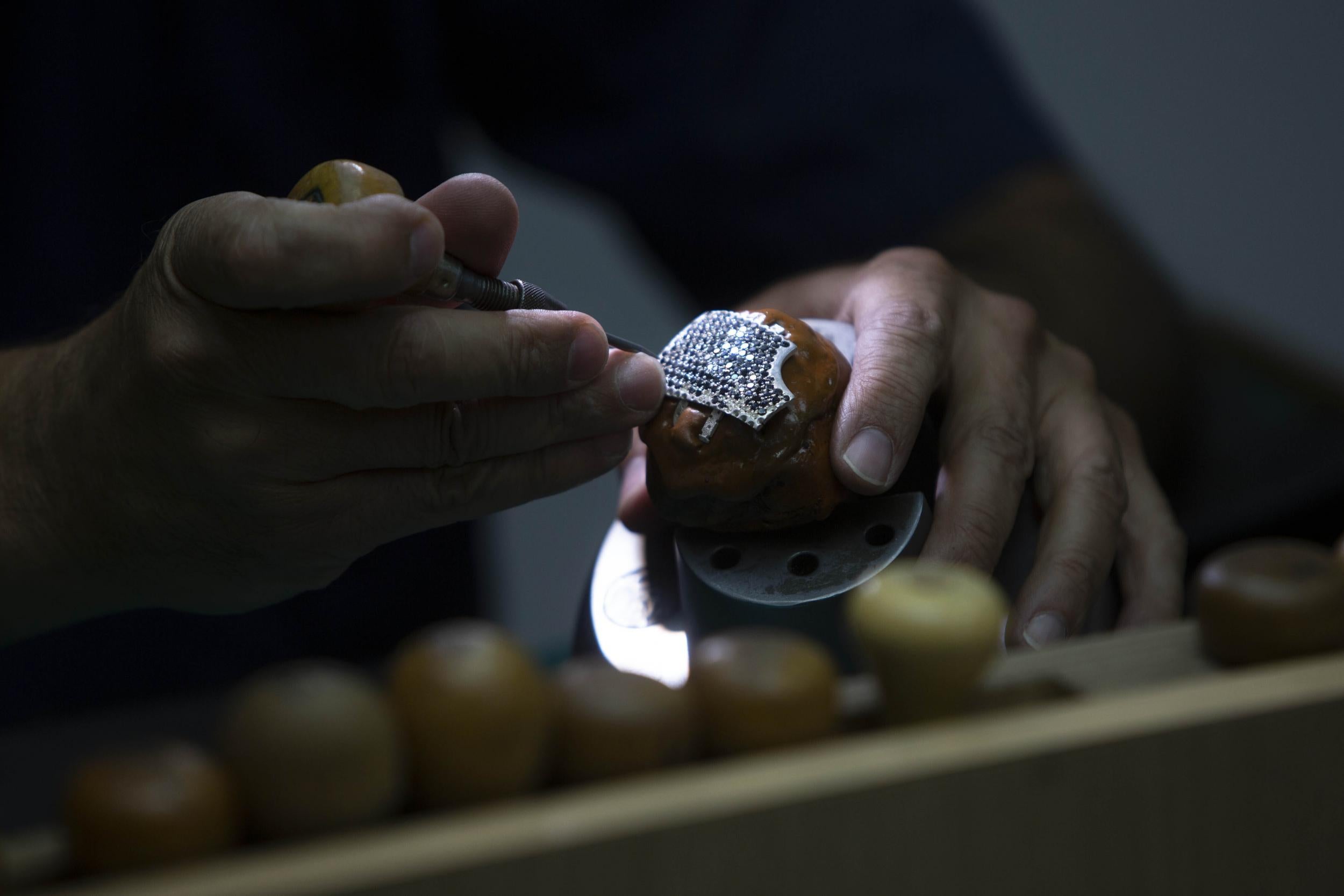 Face mask features more than 3,600 diamonds (AP/Sebastian Scheiner)