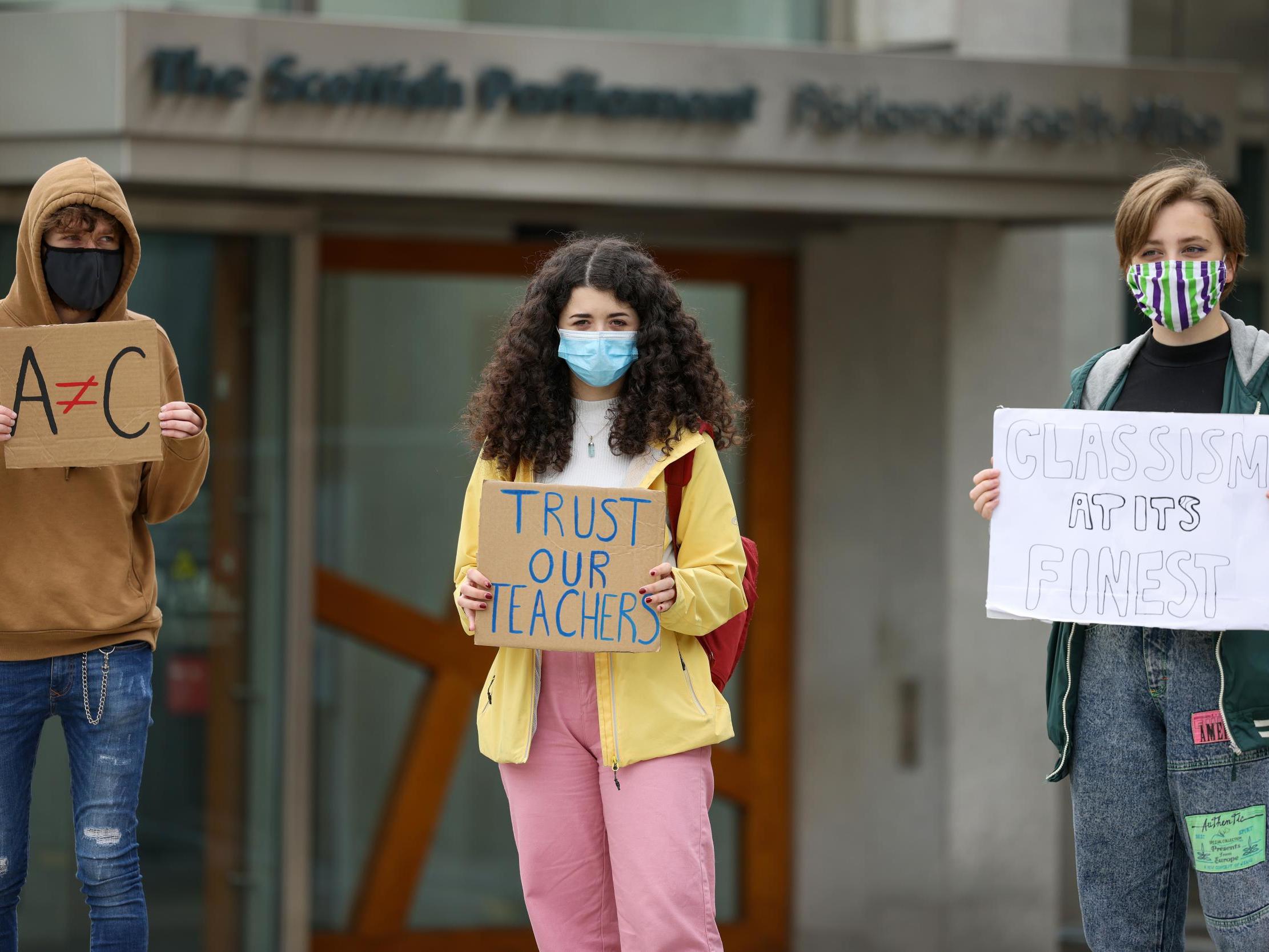 Pupils demonstrate outside the Scottish parliament over last week’s downgrading of exam results by the Scottish Qualifications Authority