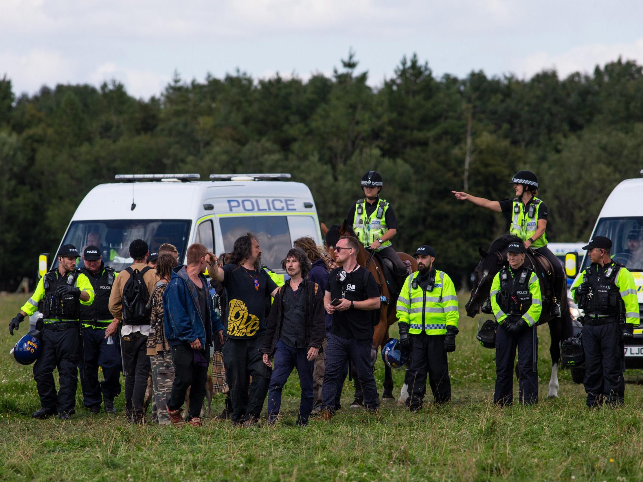 Police move partygoers on from an illegal rave near Bath