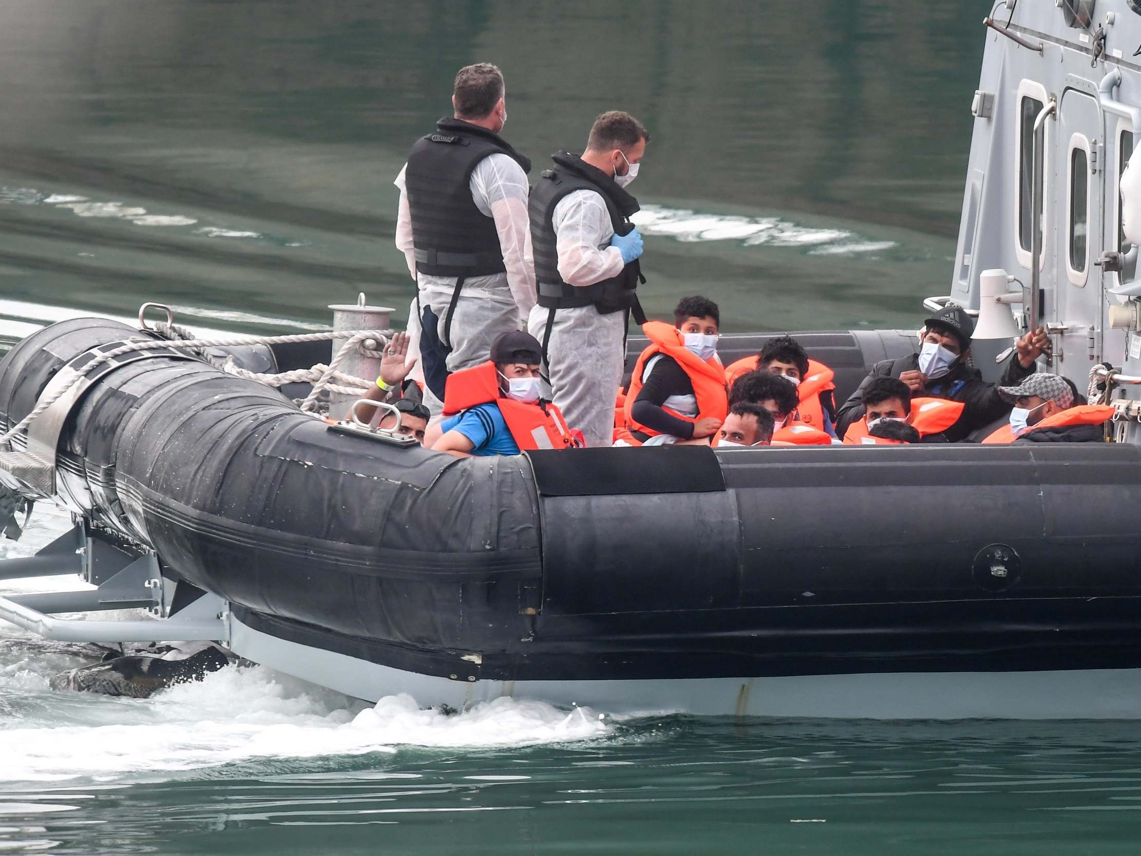 Migrants aboard a Border Force vessel in Dover (Getty Images)