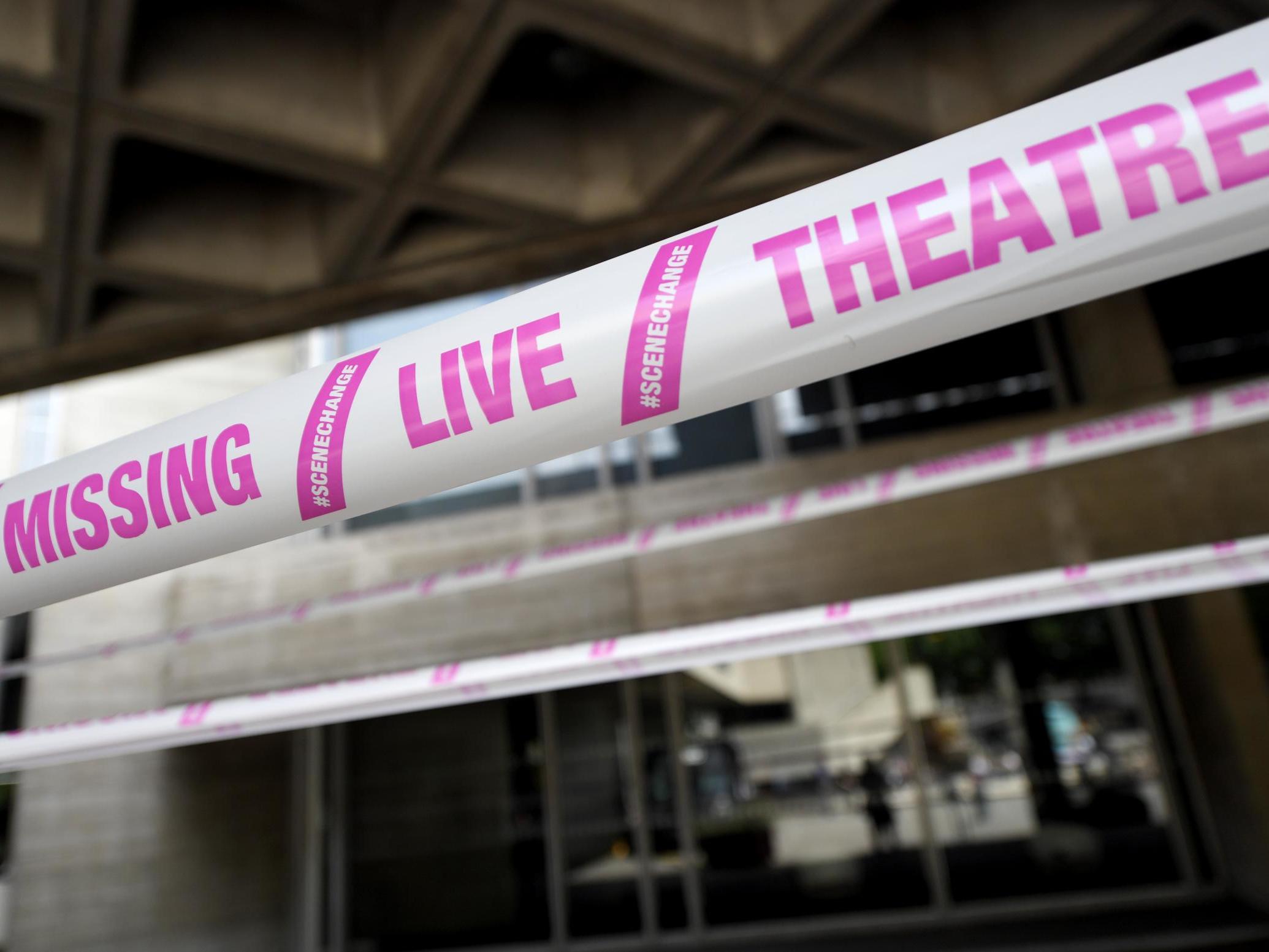 The National Theatre wrapped in pink tape as part of a campaign by #scenechange to help bring shows back into production