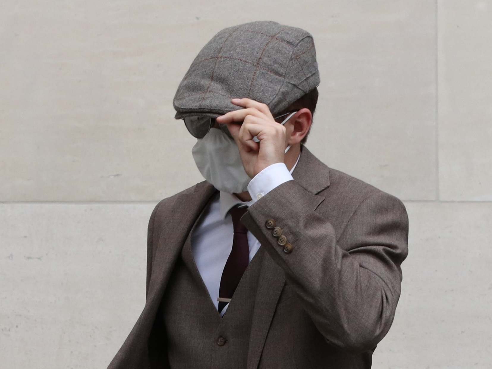 Probationary Metropolitan Police officer Benjamin Hannam, 22, leaves Westminster Magistrates' Court on 6 August