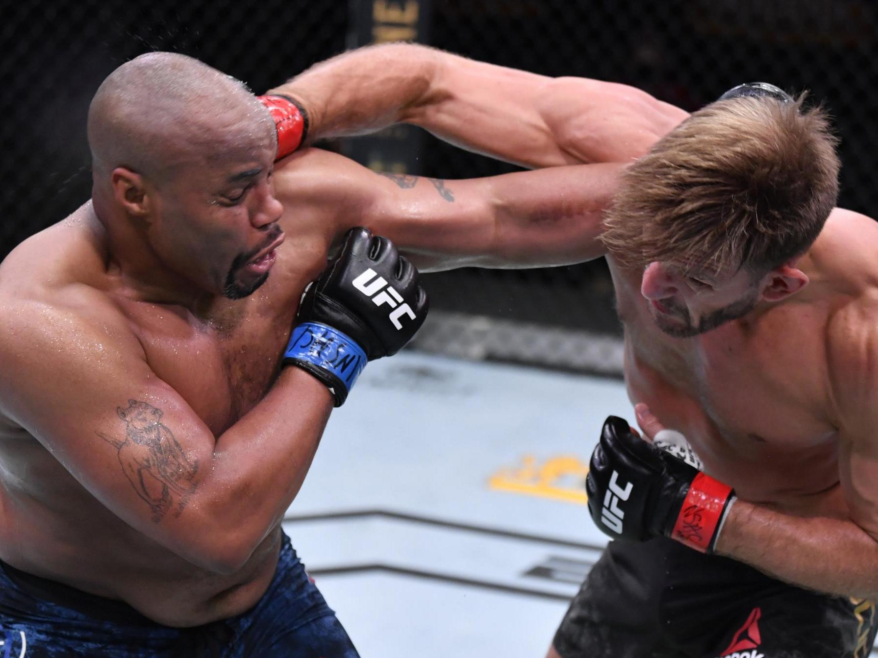 Cormier (left) and Miocic fought in a five-round war