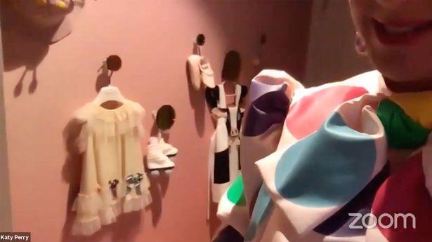 Katy Perry showed off some of her daughter's outfits that are hanging on the nursery wall