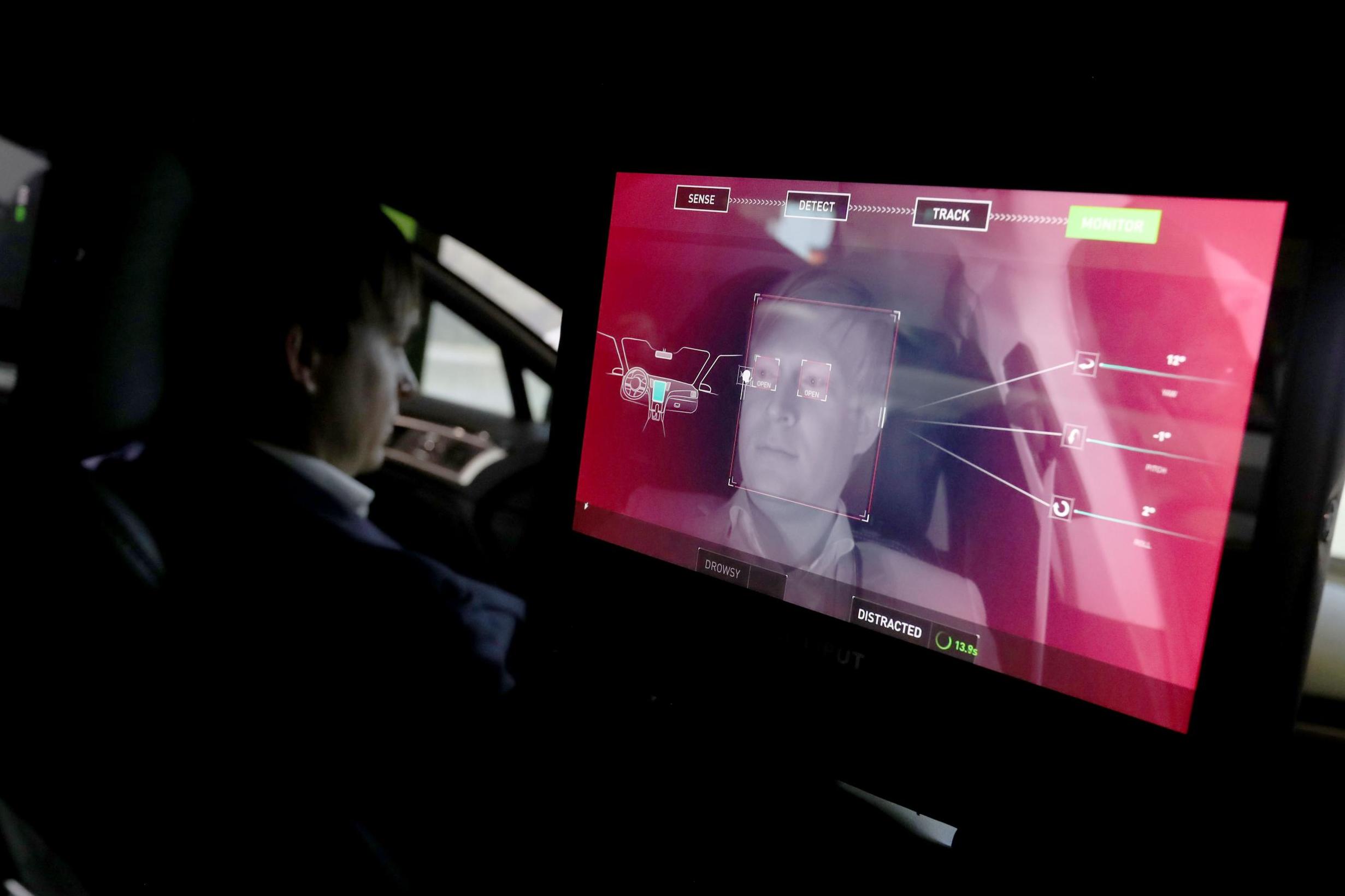 A camera monitors the driver of an Nvidia self-driving car. Millions of faces are used to inform the data (Getty)