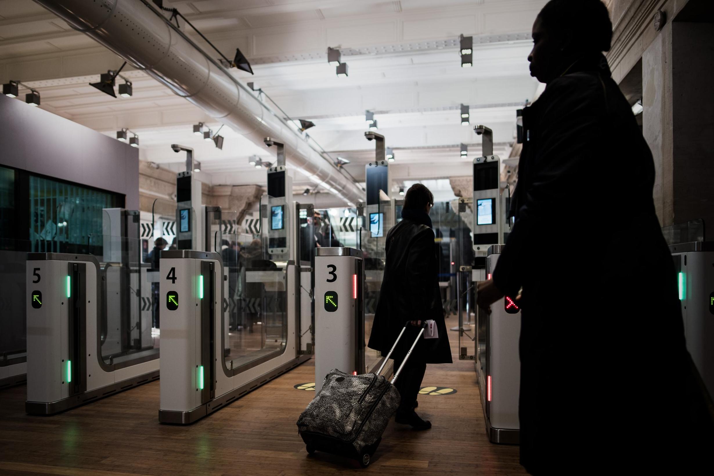 Electronic passport gates are equipped with a facial recognition system. Recent travellers were caught out by not removing their masks (AFP/Getty)