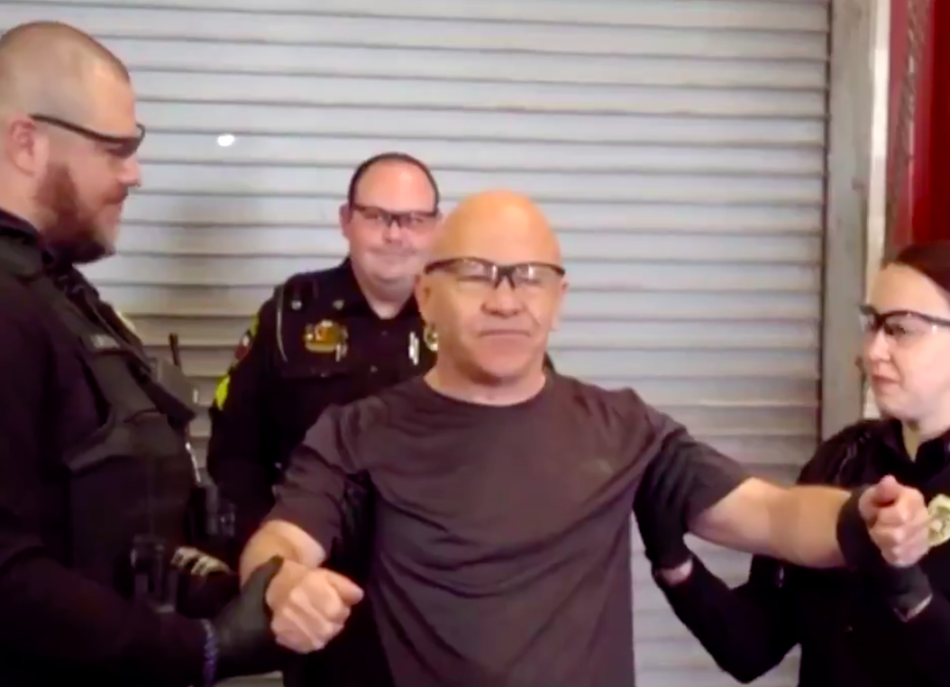 Dominic Littlewood preparing to be tasered for BBC series ‘Dom Does America’ (BBC)