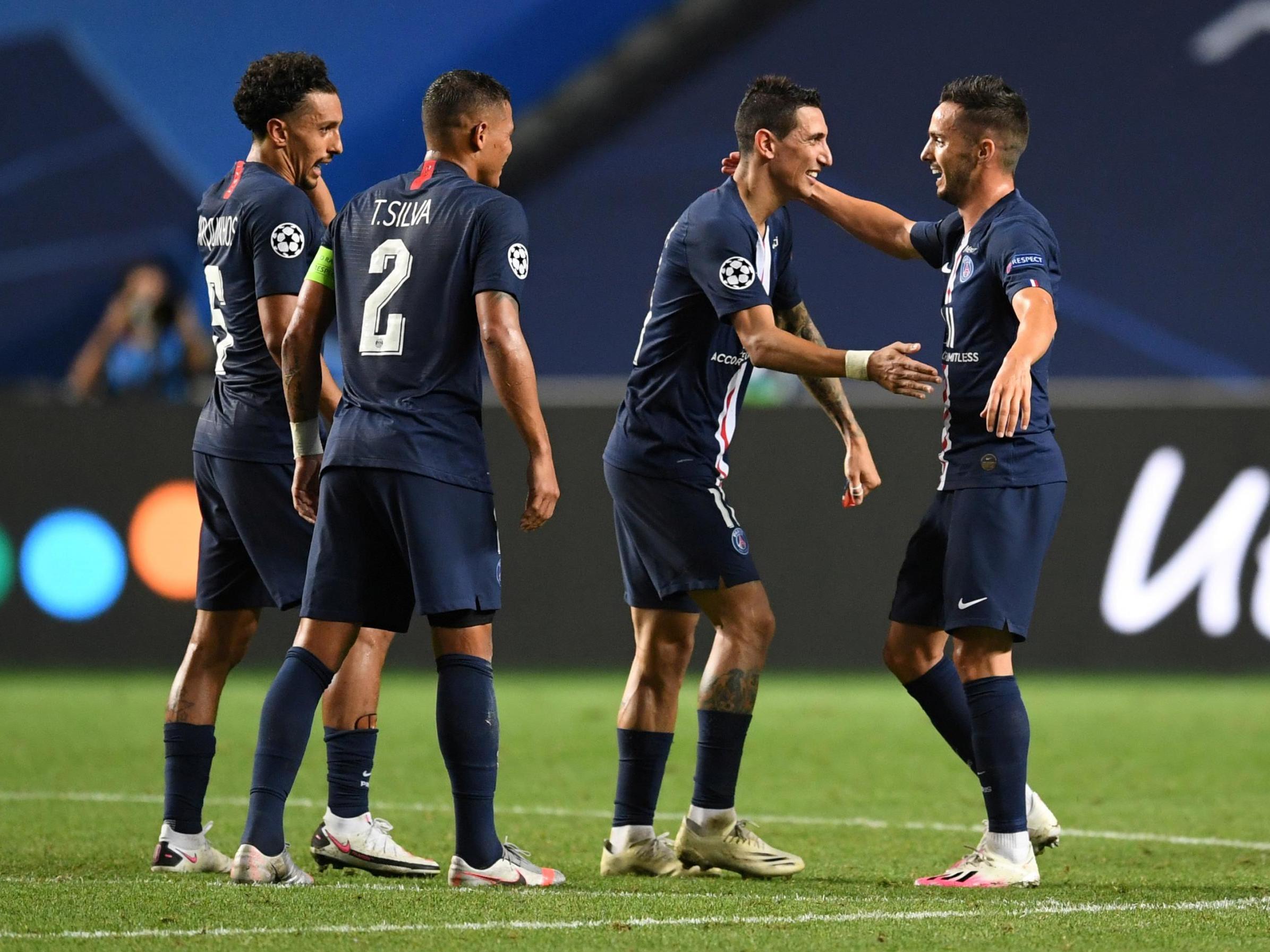 Paris St Germain's Angel Di Maria and Pablo Sarabia celebrate after the match