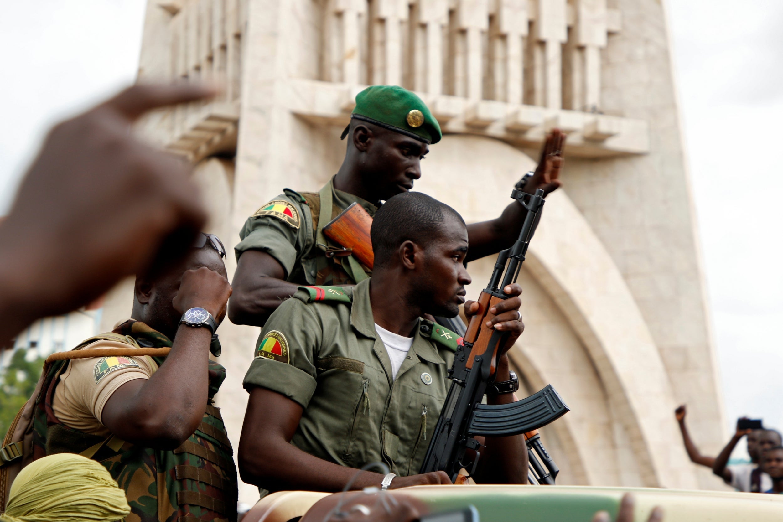 Malian army soldiers are seen at the Independence Square in Bamako after a mutiny