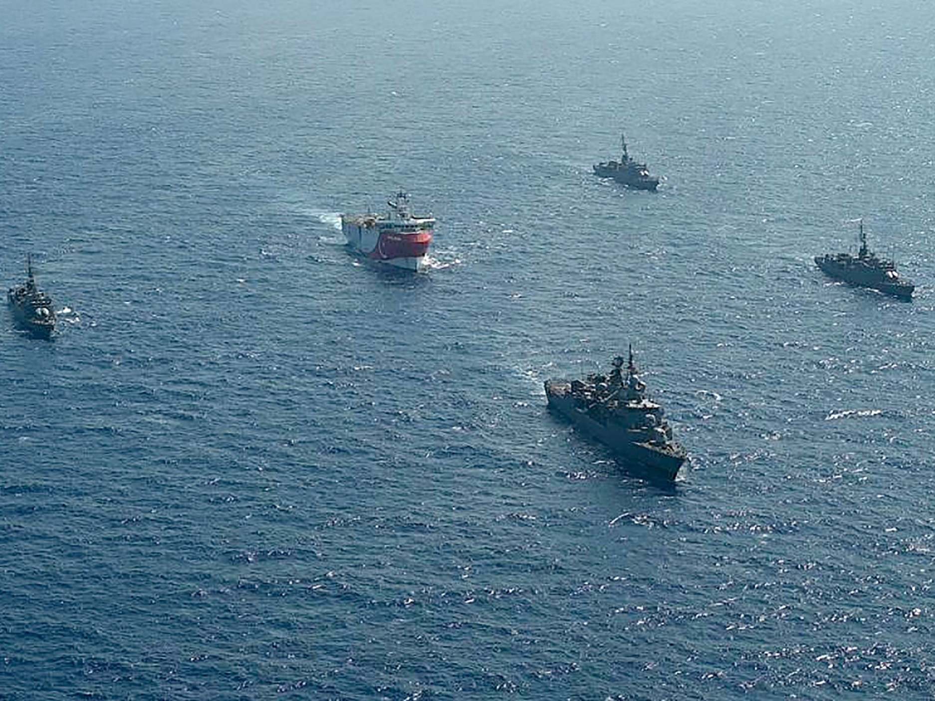 A Turkish seismic research vessel is escorted by naval ships